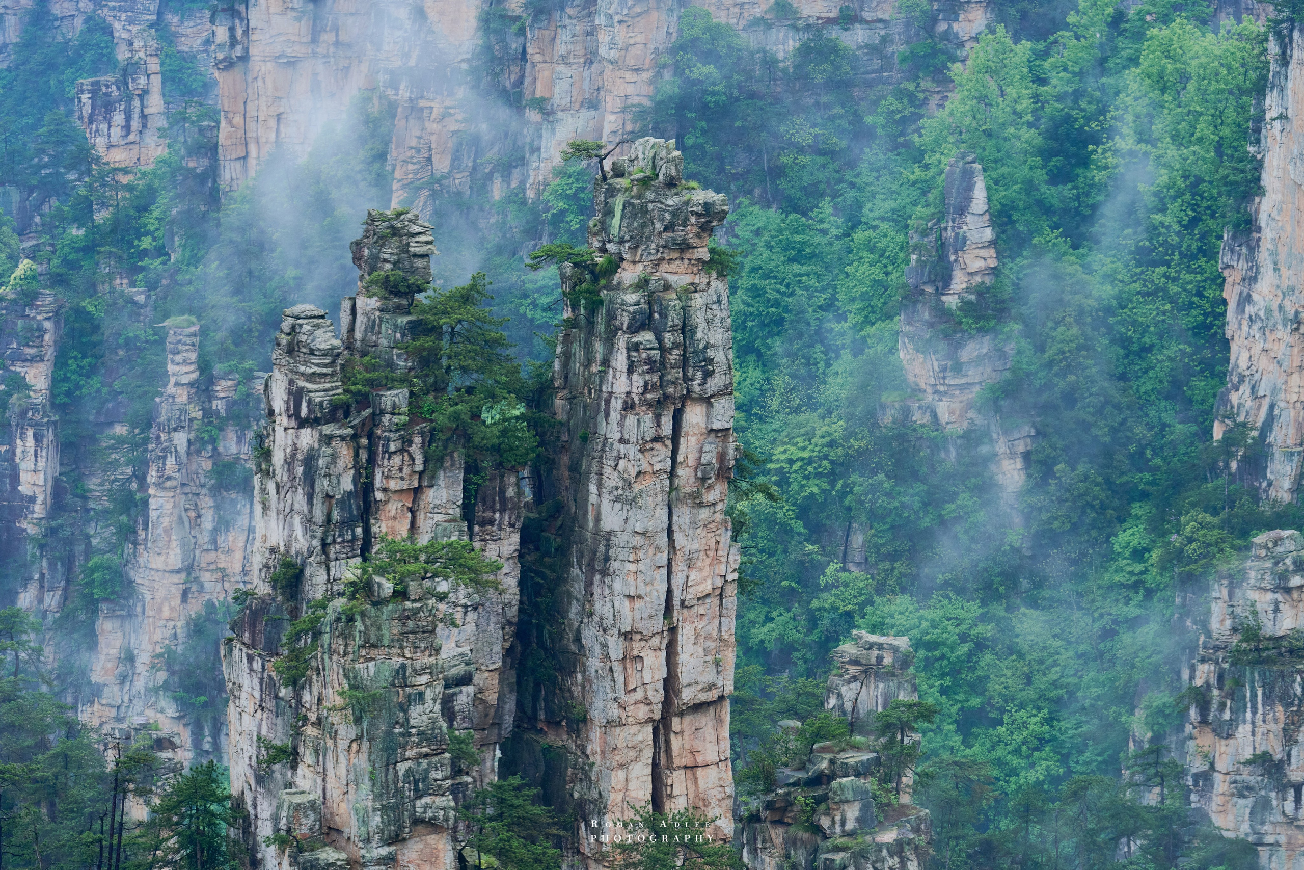 Zhangjiajie. Here, the sky seems to descend to the earth