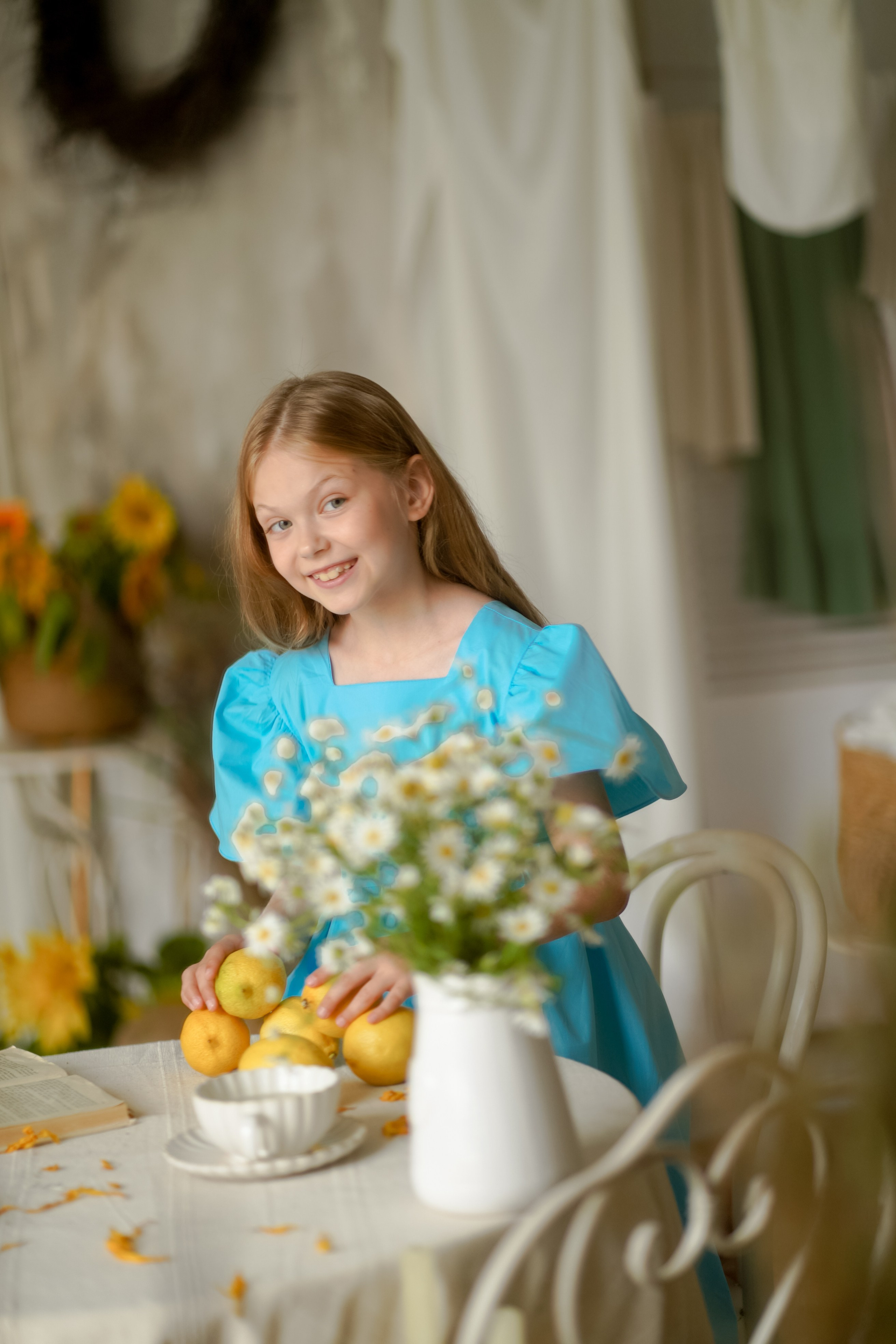 Кира с подсолнухами. Фотограф Татьяна Митрофанова