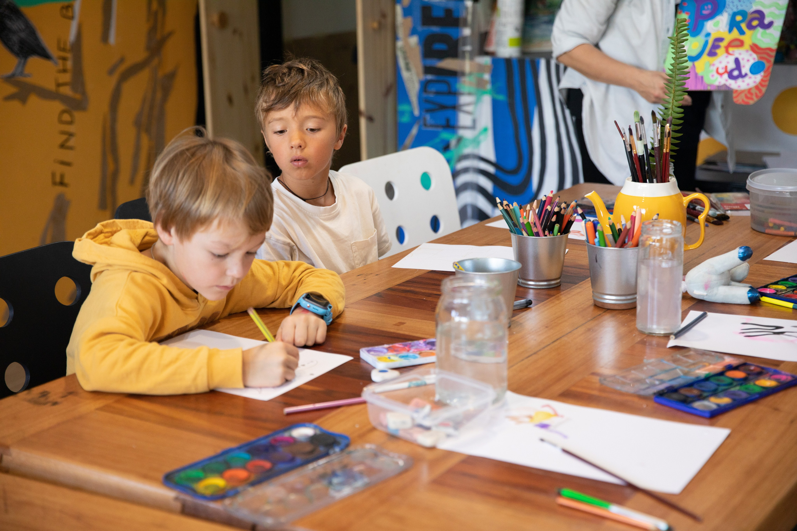 Children play and paint