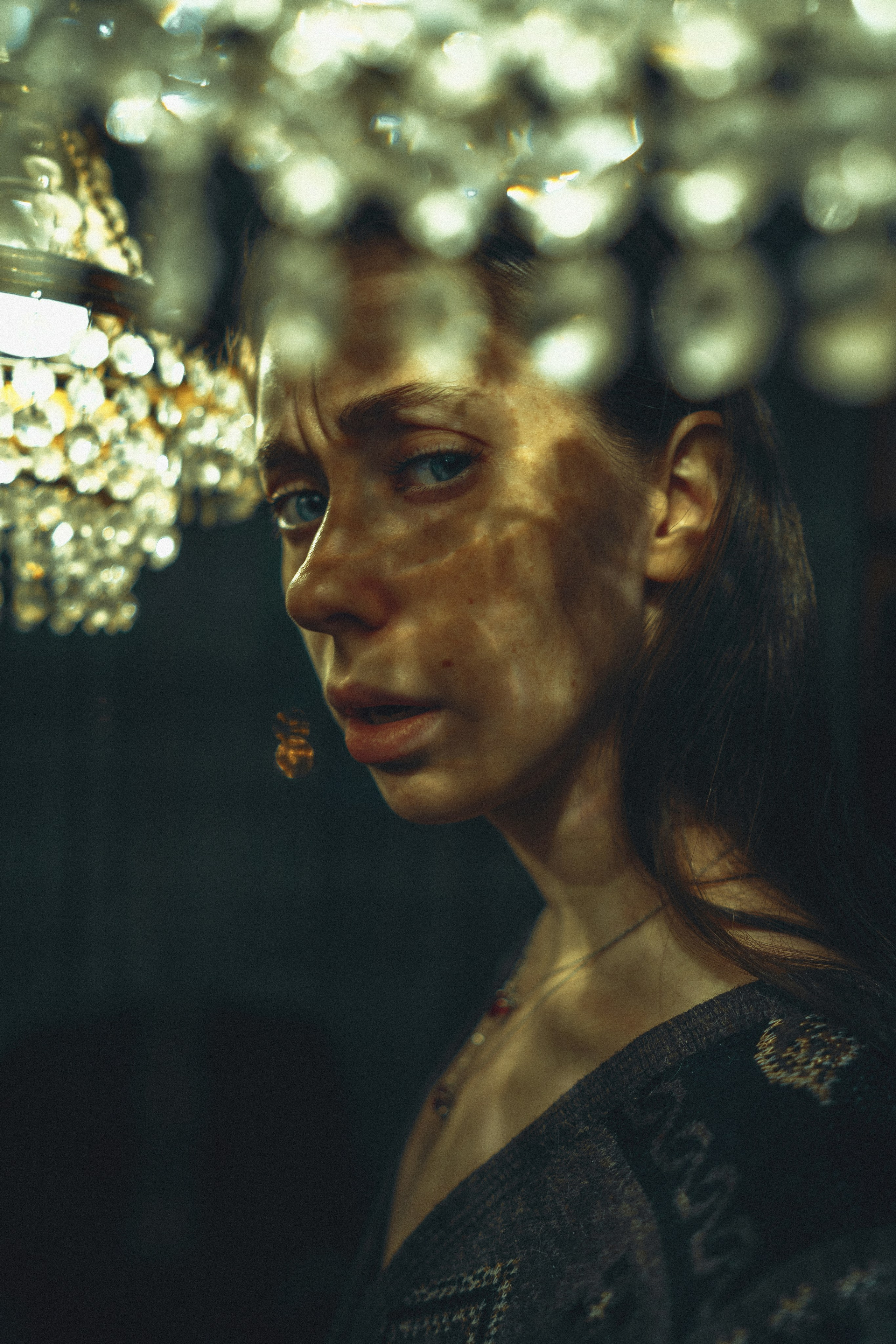 GLARES OF VINTAGE CHANDELIER