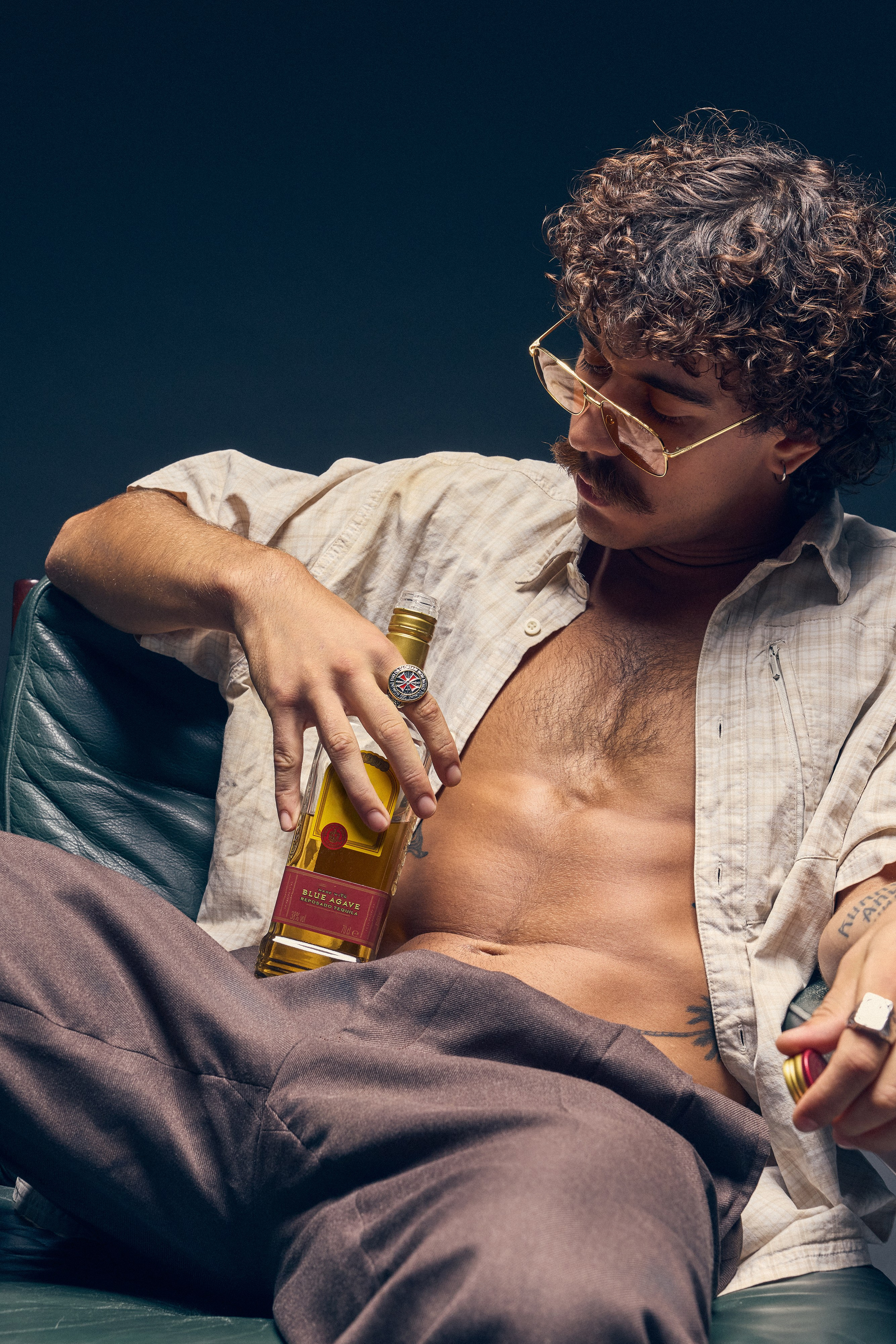 Artistic retro photo shoot with dramatic masculine aesthetic