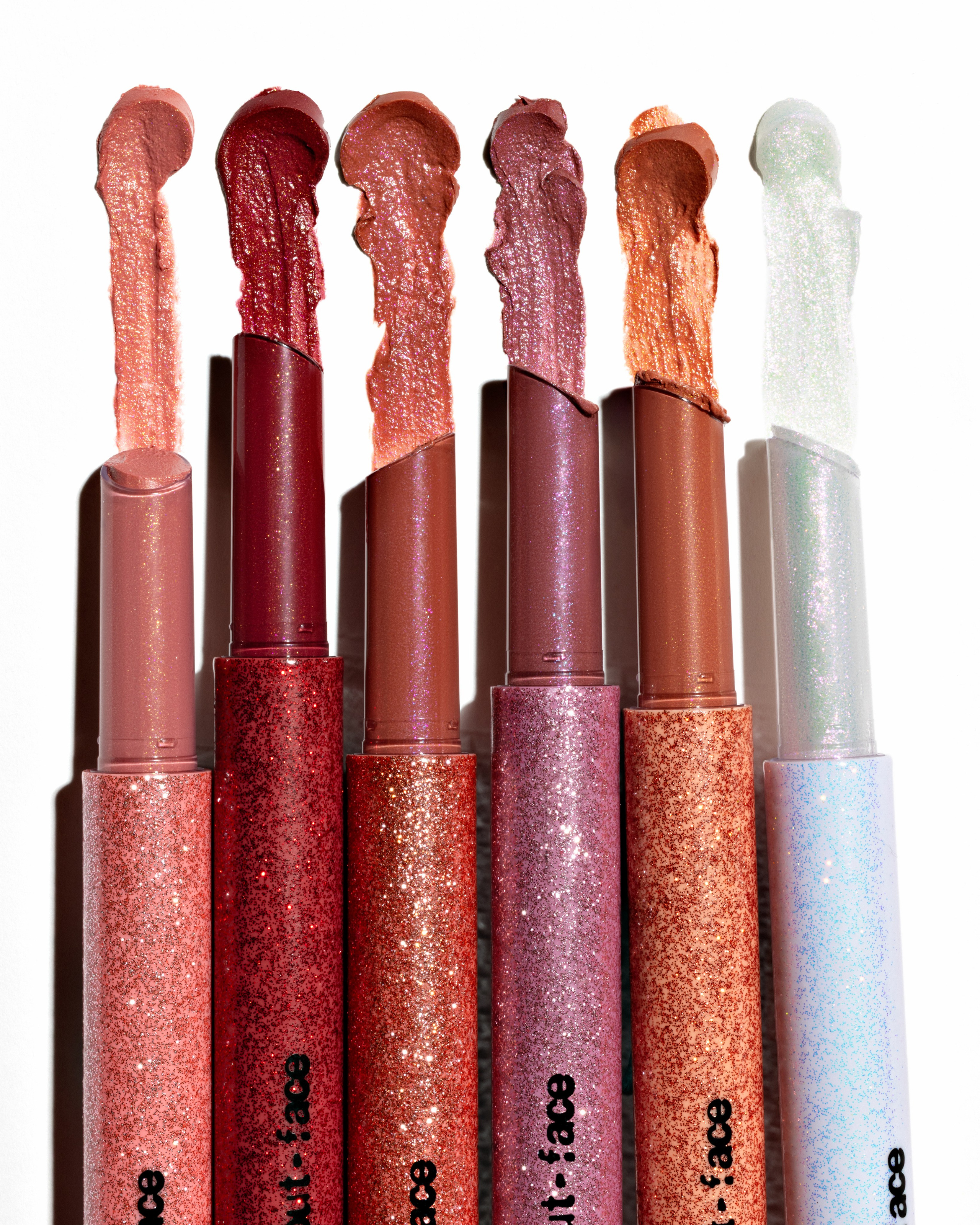 About Face shimmer sticks lipstick. Retouching, photo editing, portfolio retoucher