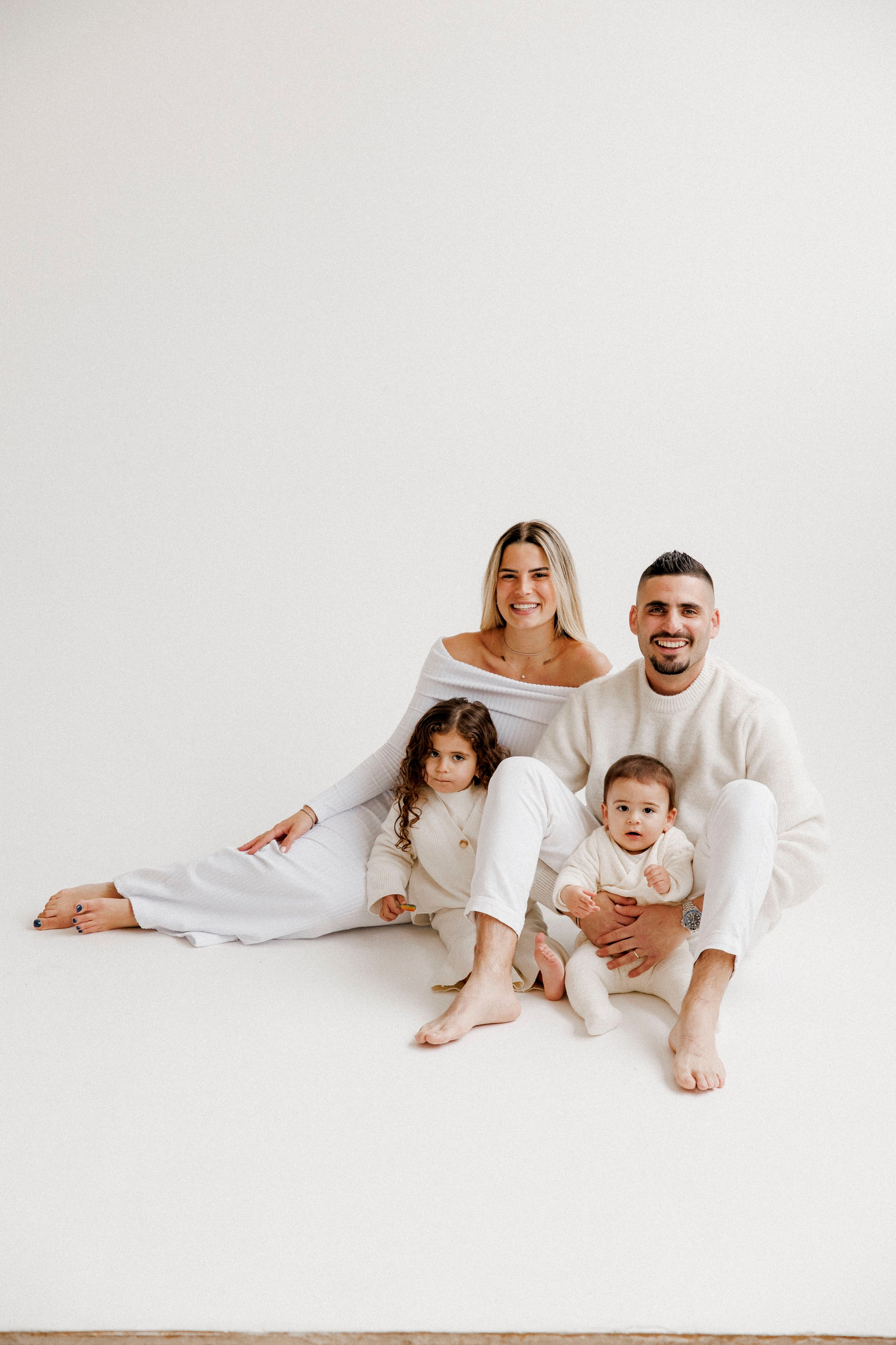 Family photoshoot in White Studio. Wedding and family photographer