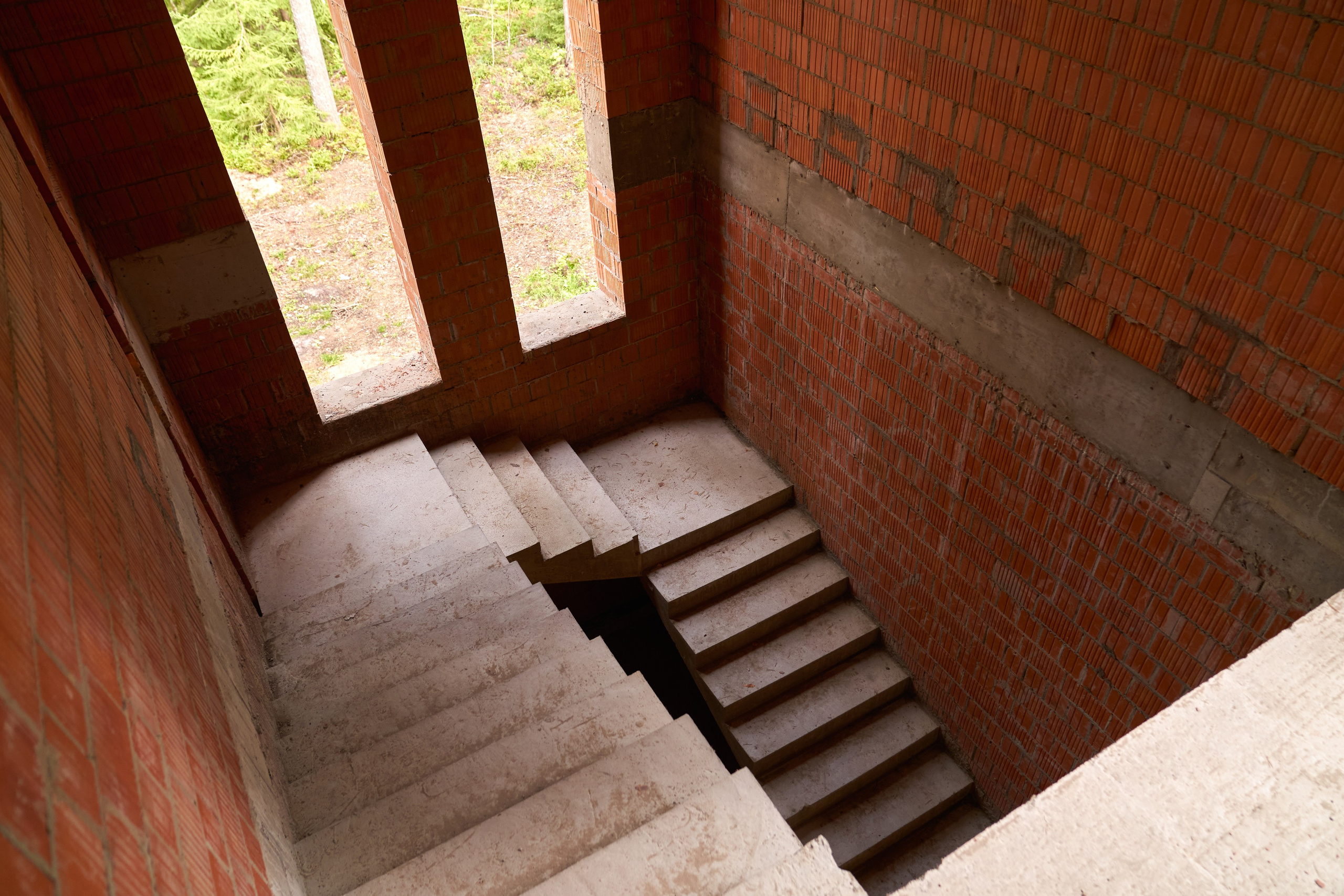 Фотосъёмка строительства дома в Комарово — архитектурный проект на стадии кирпичных работ. Сергей Горшенин — профессиональный фотограф