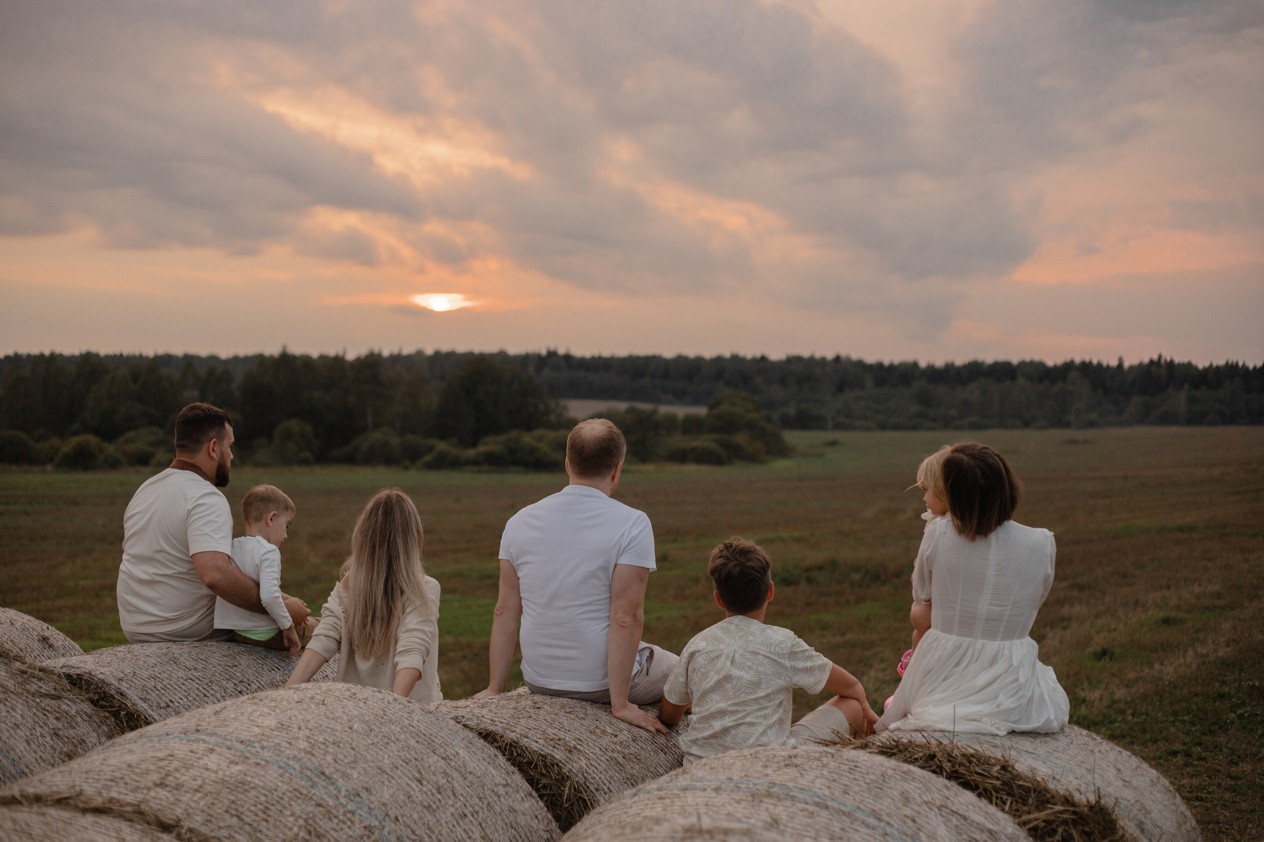 В стогах сена :)