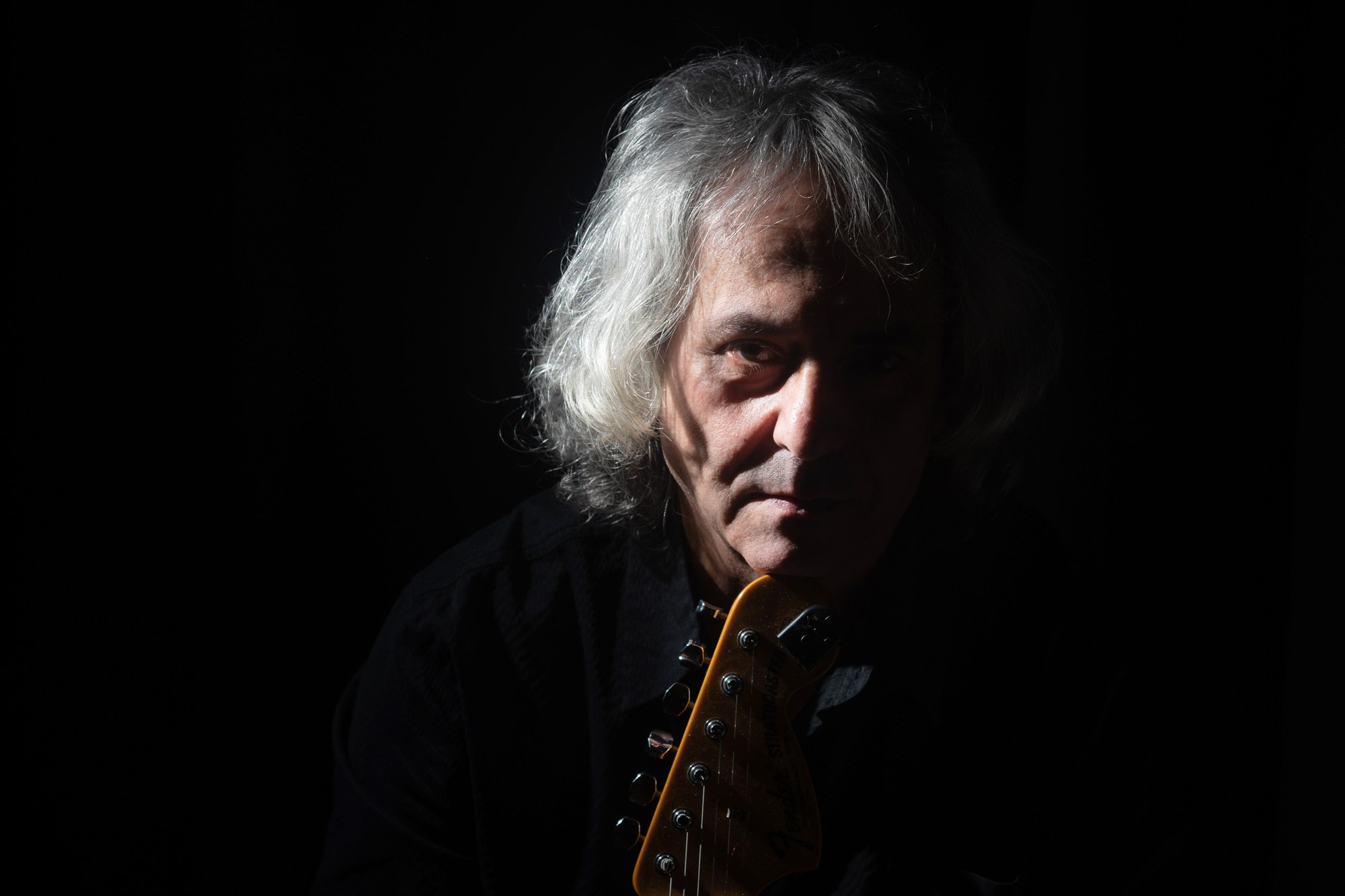 dramatic portrait noir style man person studio low key musician guitar Rehovot Israel