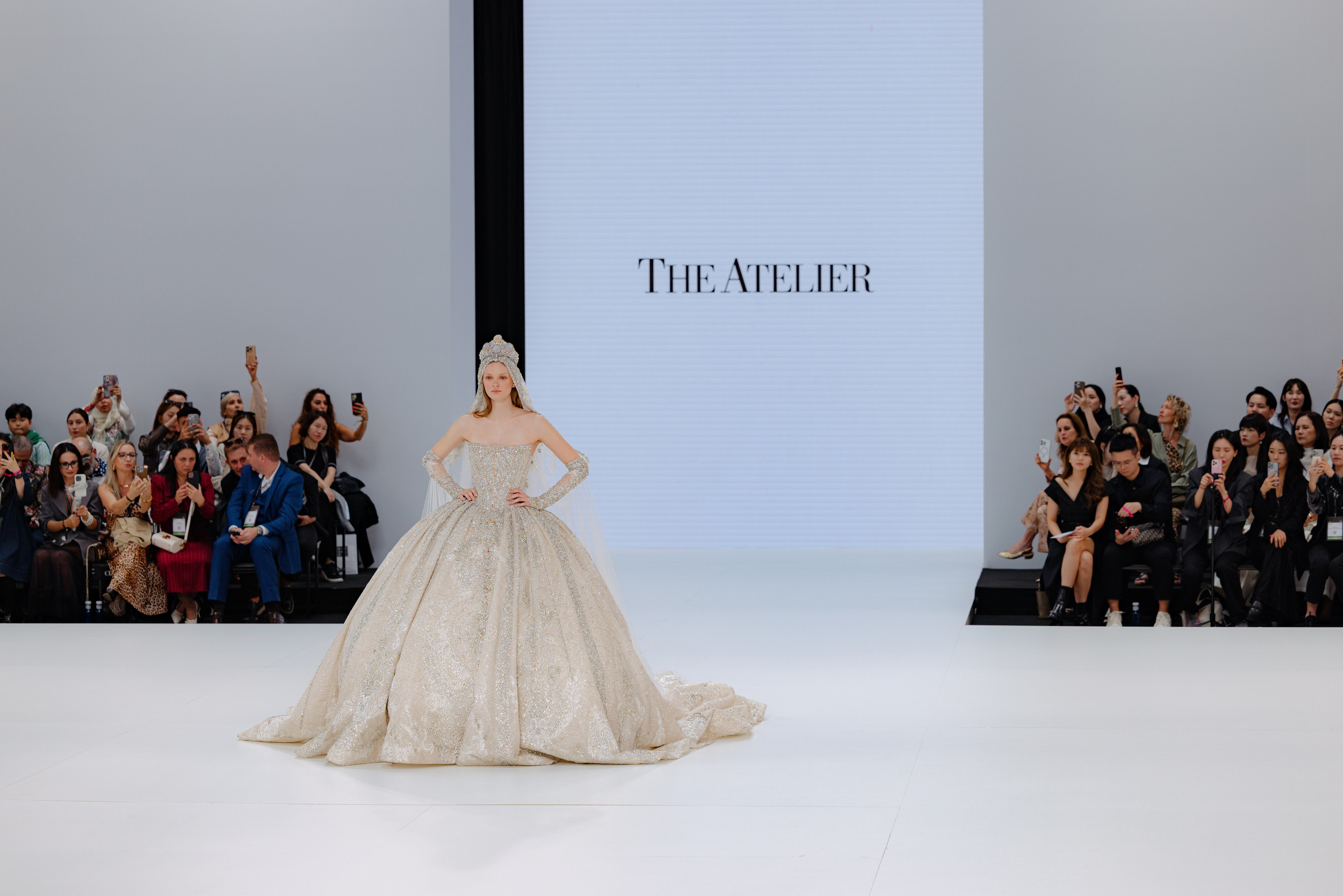 Close-up of bridal accessories — veil and lace at bridal fashion week