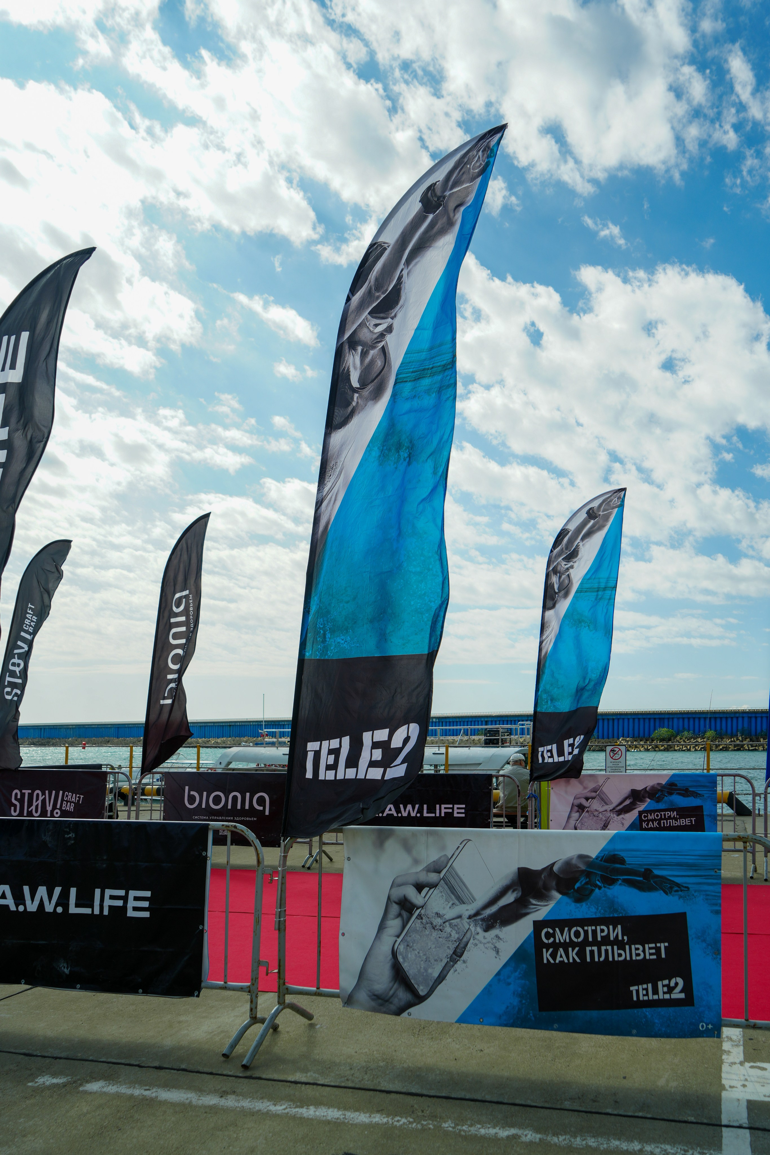 Фотоотчет партнерской интеграции для компании TELE2 на фестивале Ironstar. Репортажный фотограф в Красной Поляне и Сочи Павлюченко Екатерина