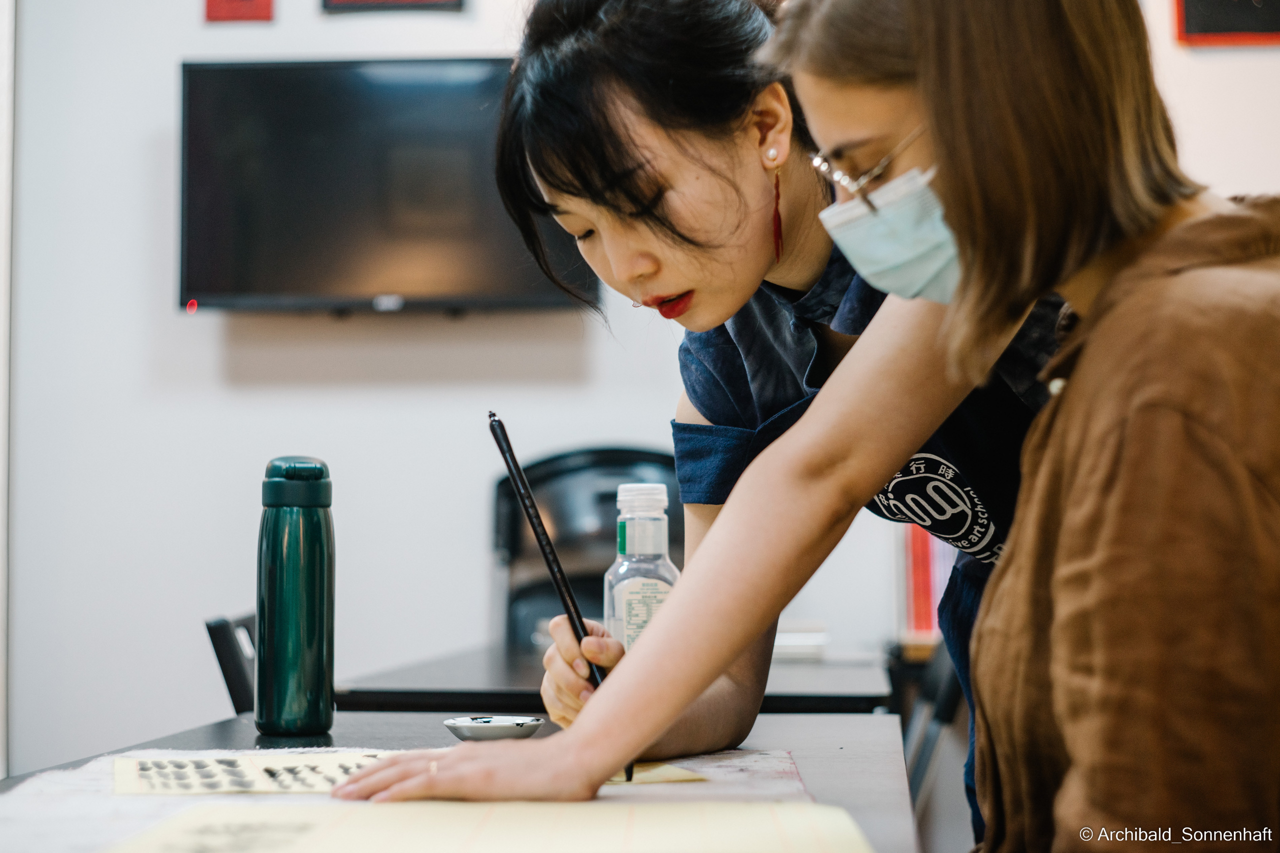Calligraphy, Korean food and Black swans. Photographer in Guangzhou, China. Archibald Sonnenhaft