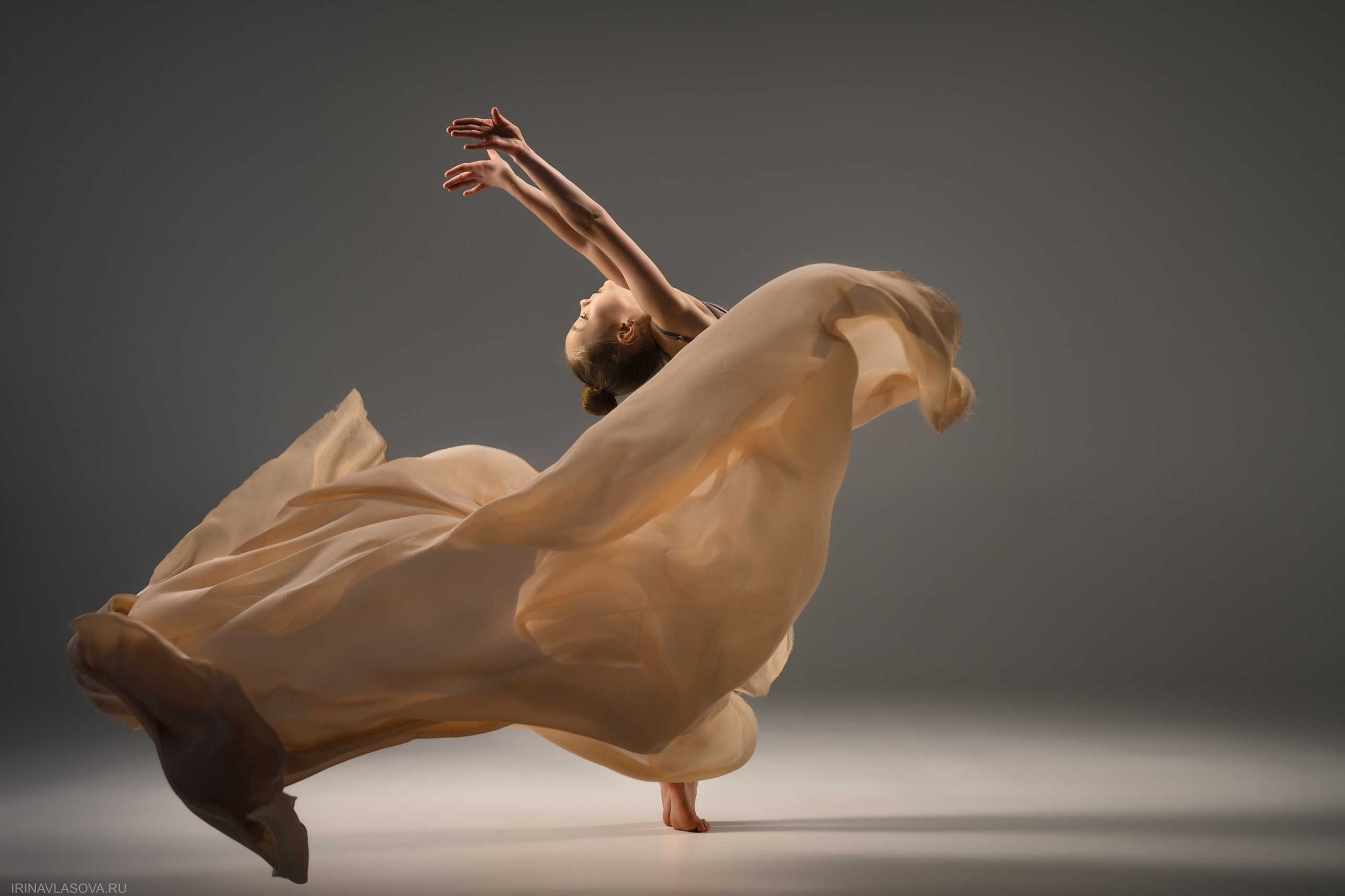 photo shoot of gymnasts with fabrics