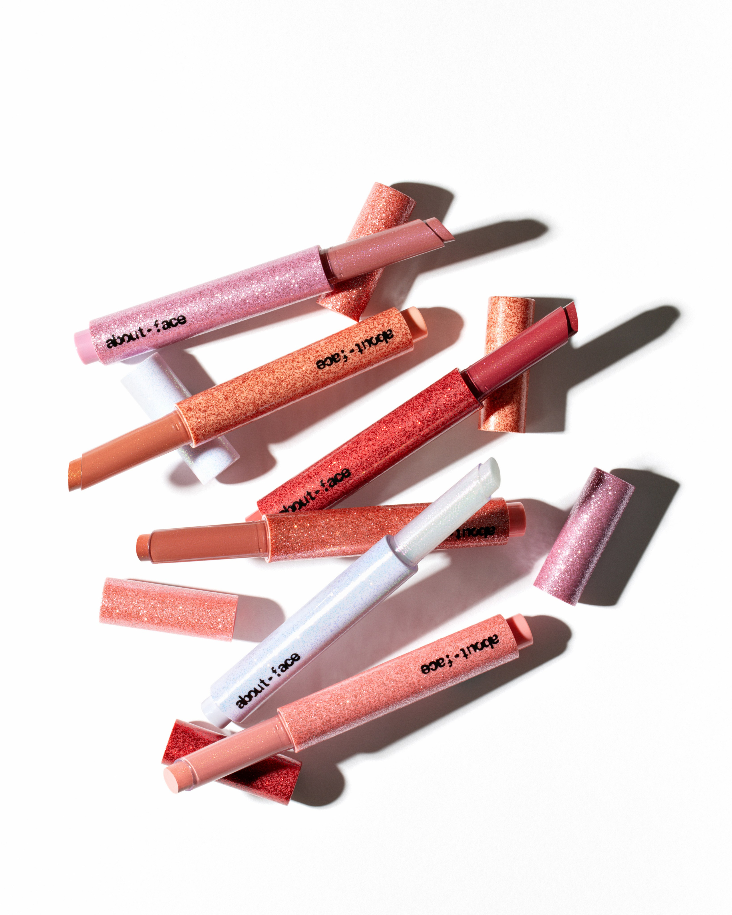 About Face shimmer sticks lipstick. Retouching, photo editing, portfolio retoucher