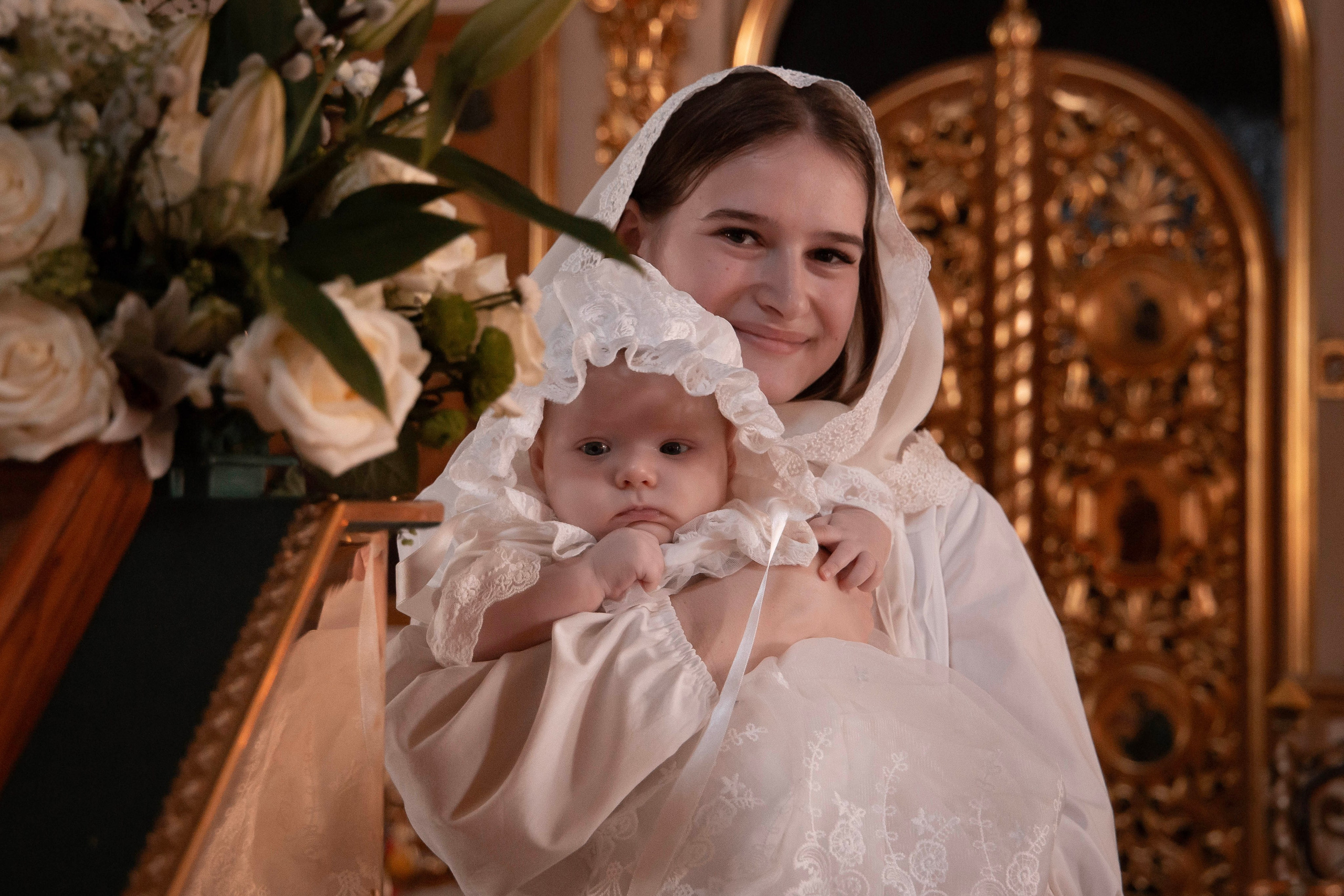 Малышка Катюша на руках у крёстной мамы. Портрет. 