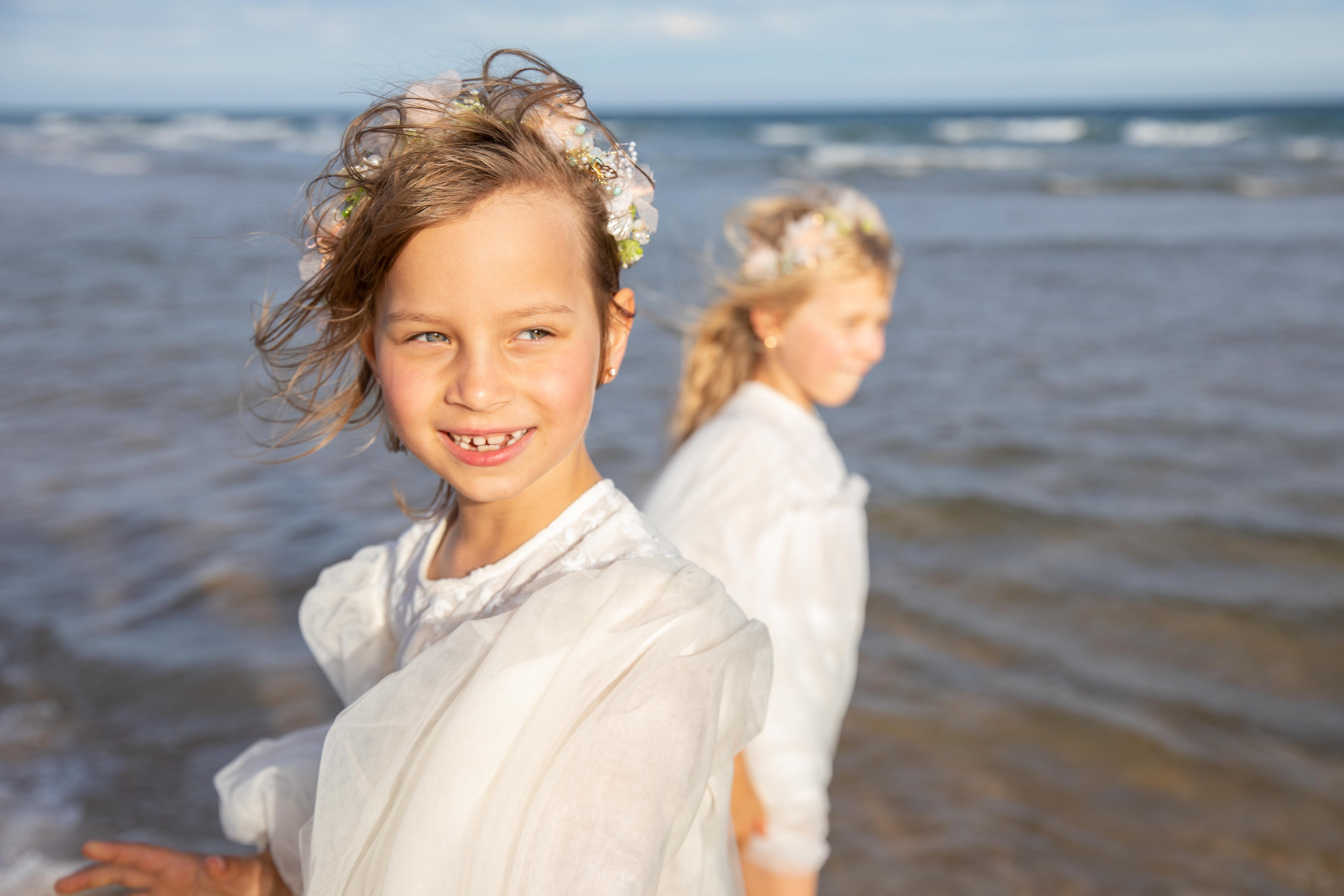 Family on the ocean. Professional Photographer in Portugal. Oksana Lomnova