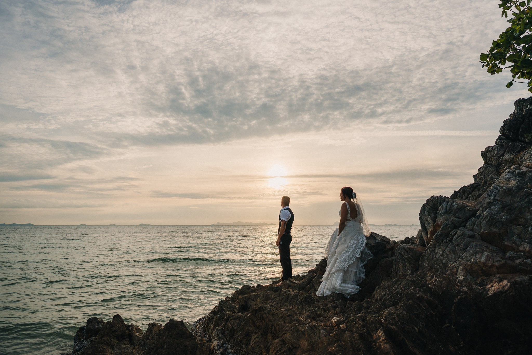 Romantic escape wedding in Koh Samui, Thailand with bride, groom and children on a beautiful tropical beach