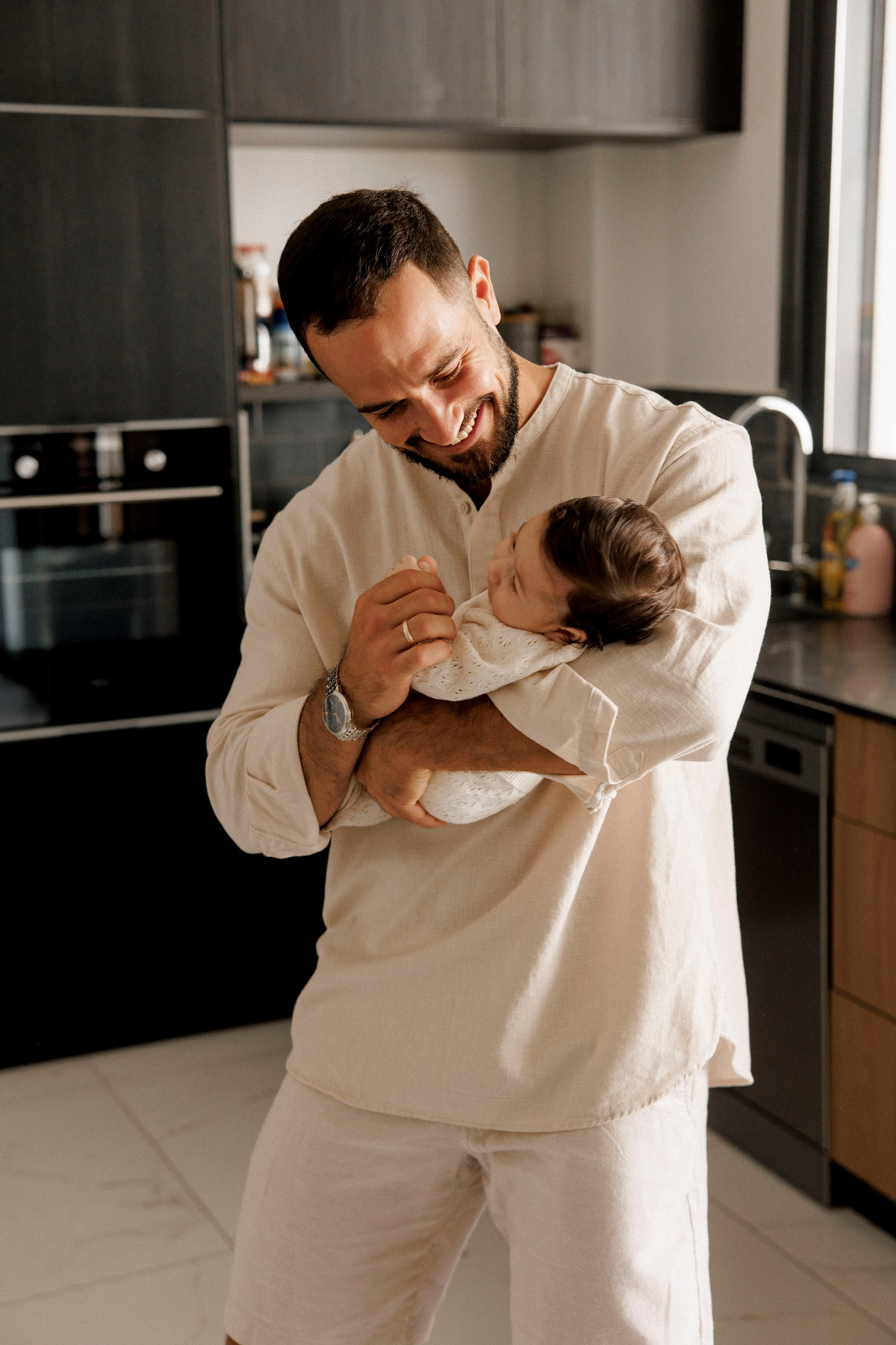 New born family photoshoot at home. Wedding and family photographer