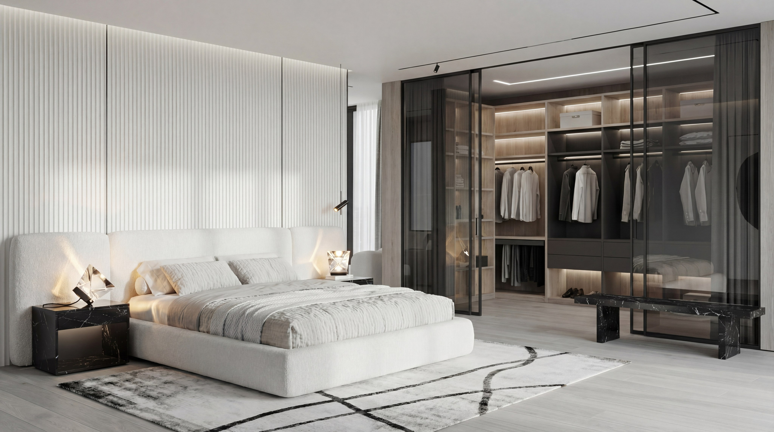Интерьер мастер-спальни с гардеробной в проекте квартиры 125 м² от Валерии Котович: кровать с мягким изголовьем, стеклянные перегородки, мраморные тумбы и рифленые панели.