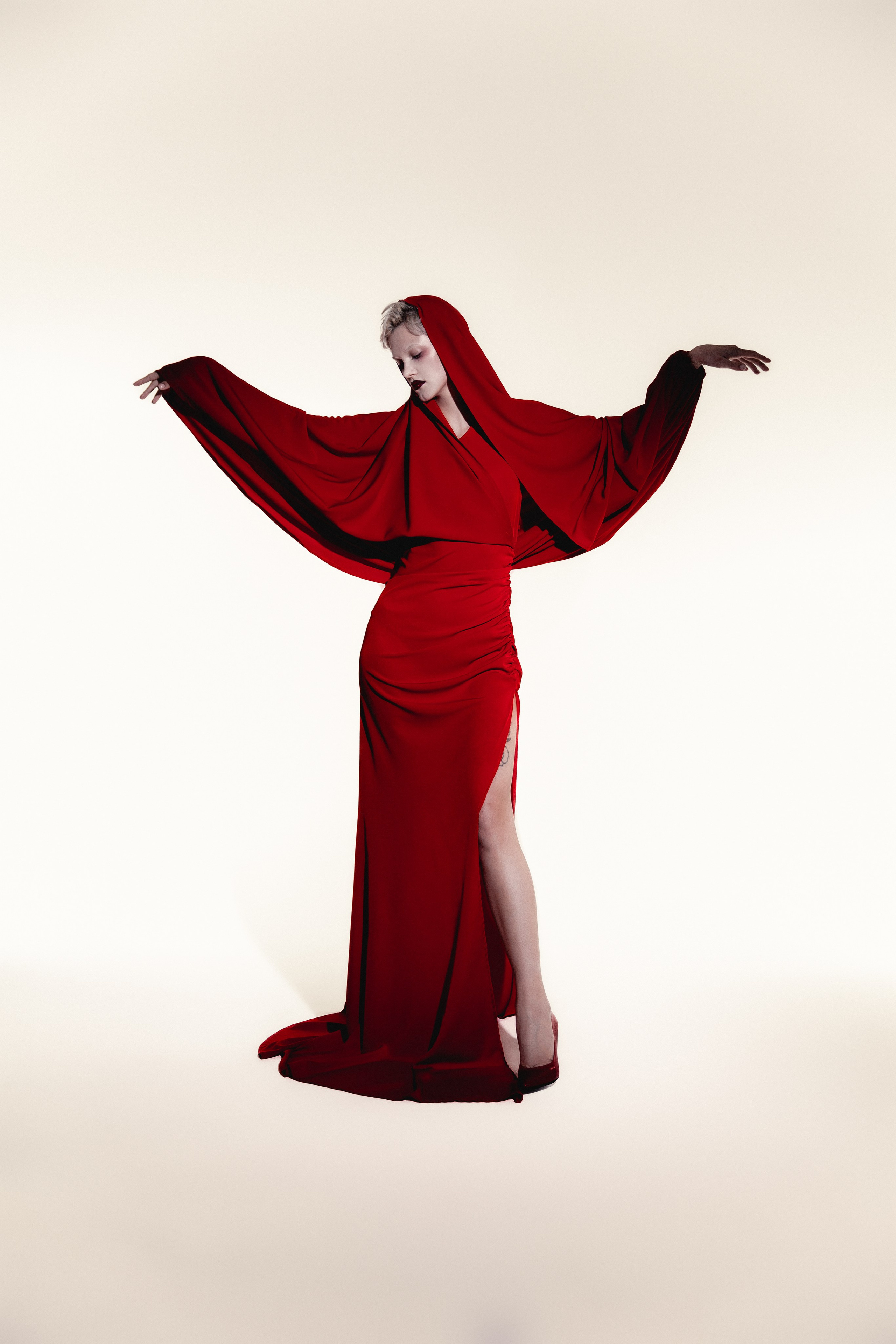 Red. Photographer. Producer. Retoucher