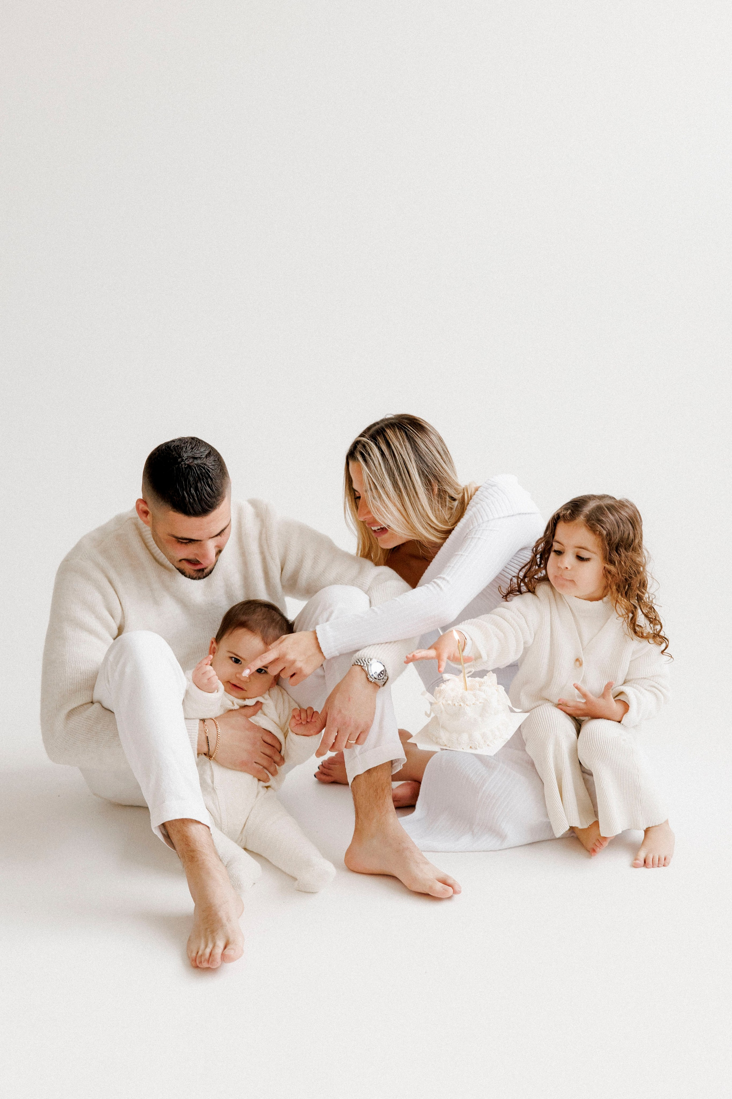 Family photoshoot in White Studio. Wedding and family photographer