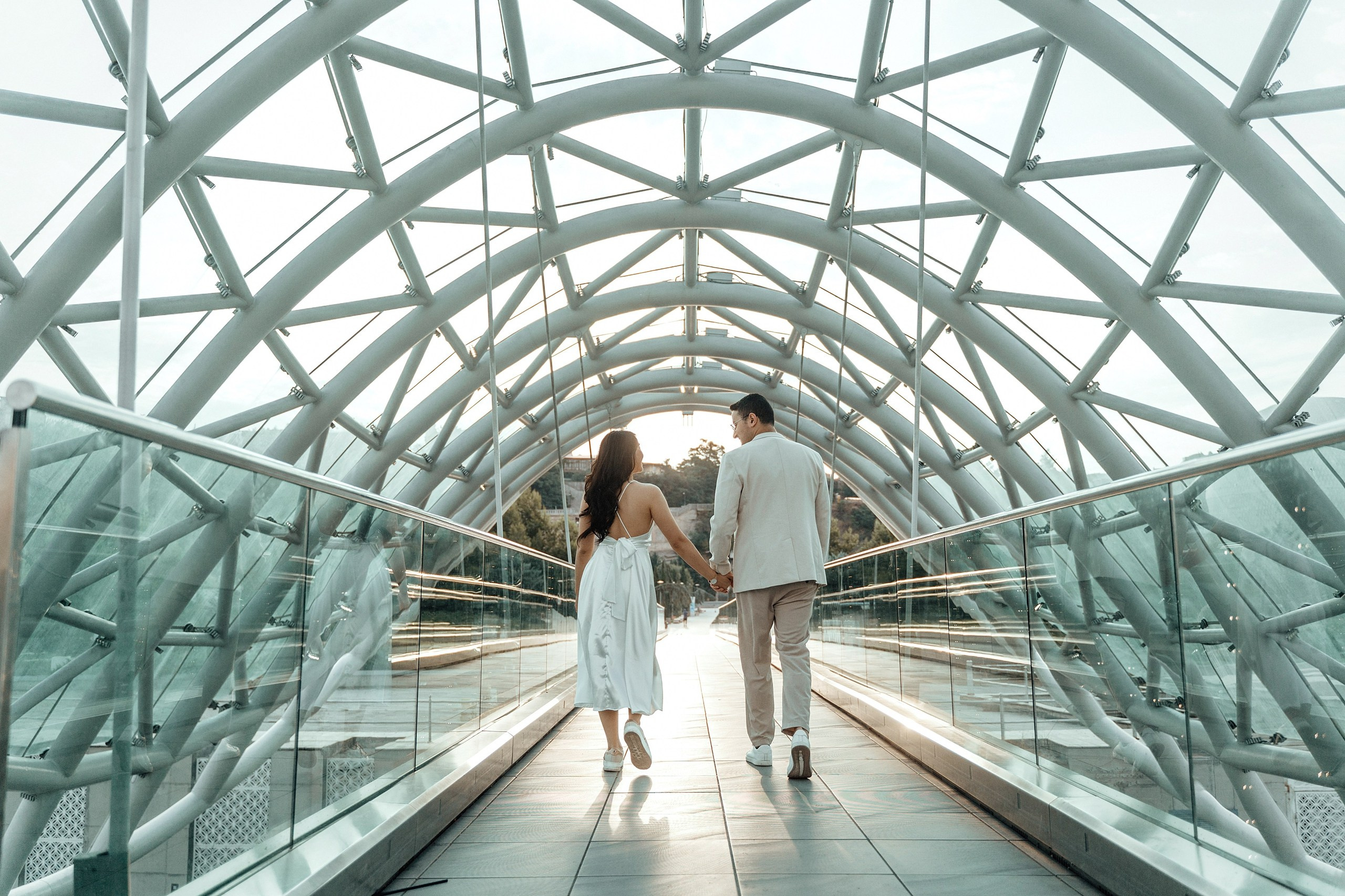 Alaeddine & Matika on the Peace Bridge in Tbilisi. Photographer Sergey Otkrytyi in Batumi & Tbilisi