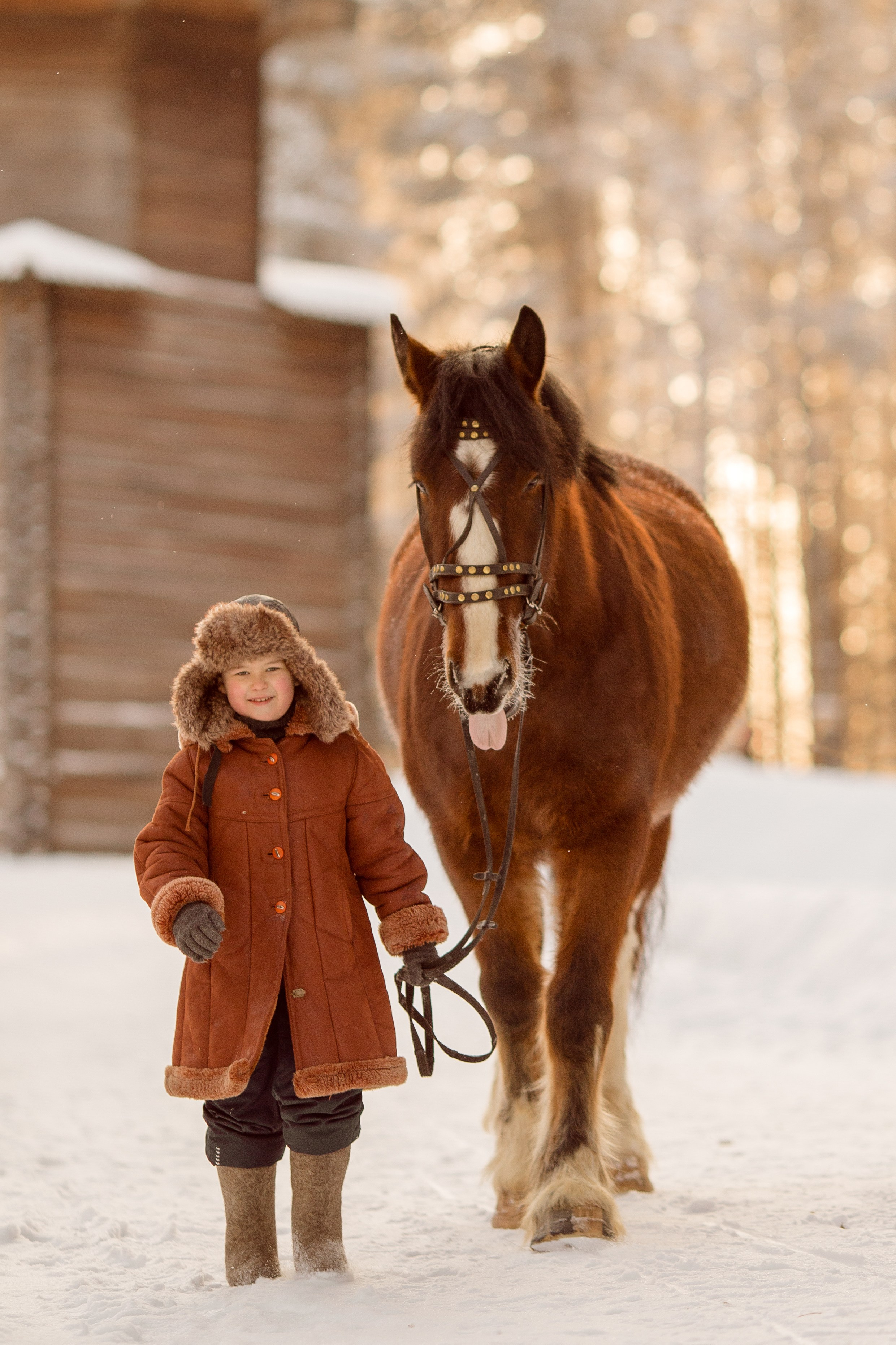 Детская фотосессия с лошадью зимой