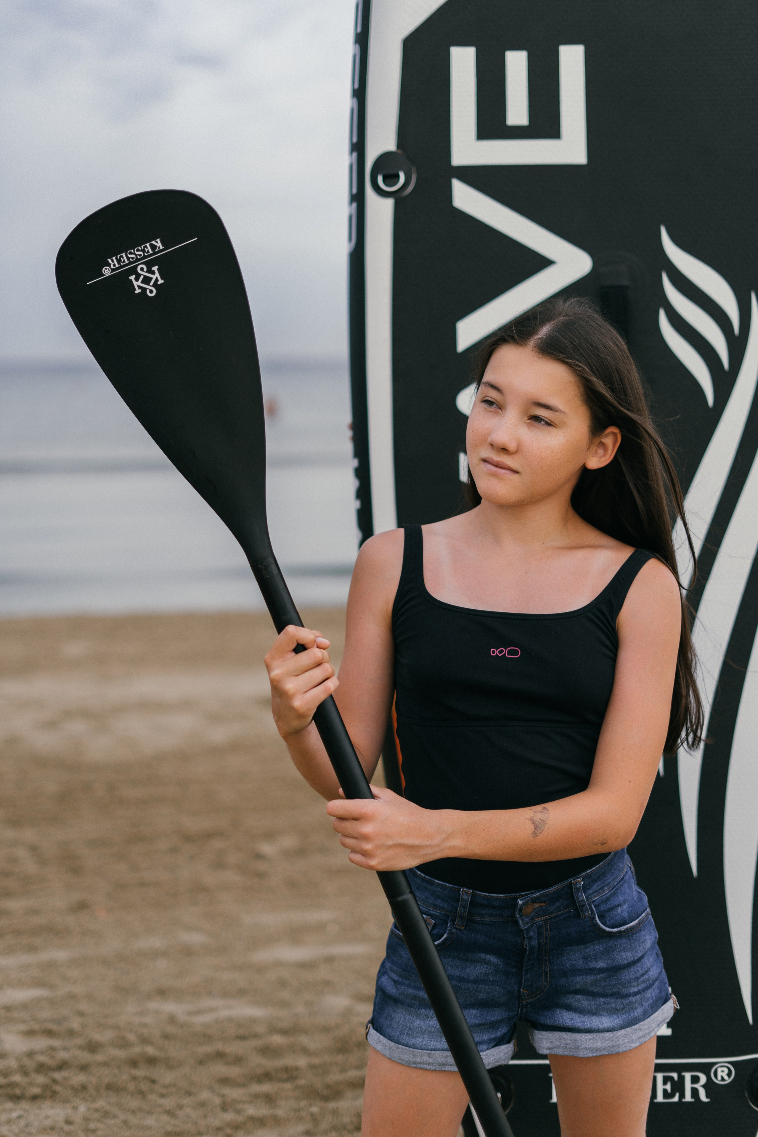 Фото с высоты птичьего полета – семья пишет на песке «Любовь», фотограф Геленджик