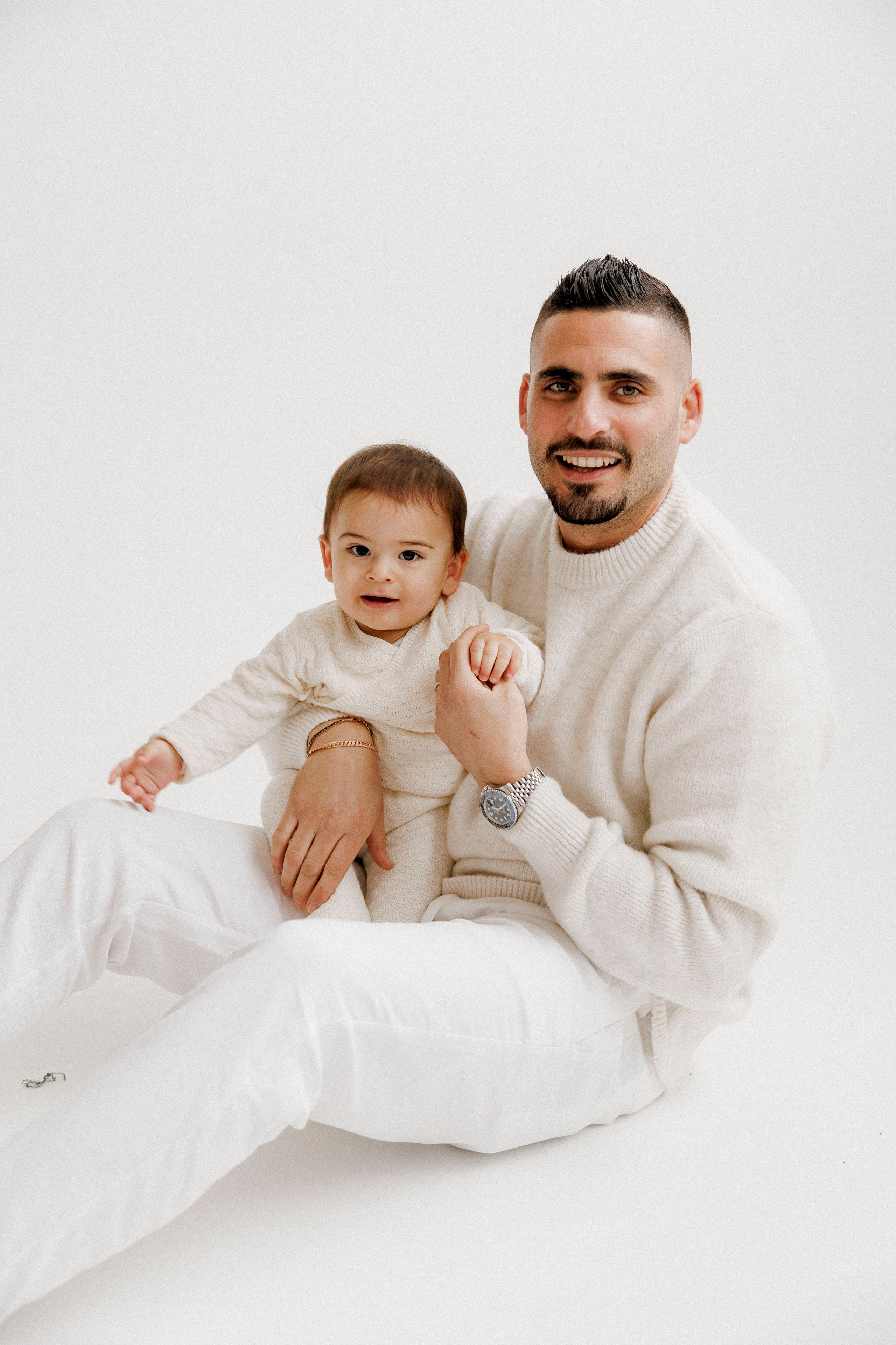 Family photoshoot in White Studio. Wedding and family photographer