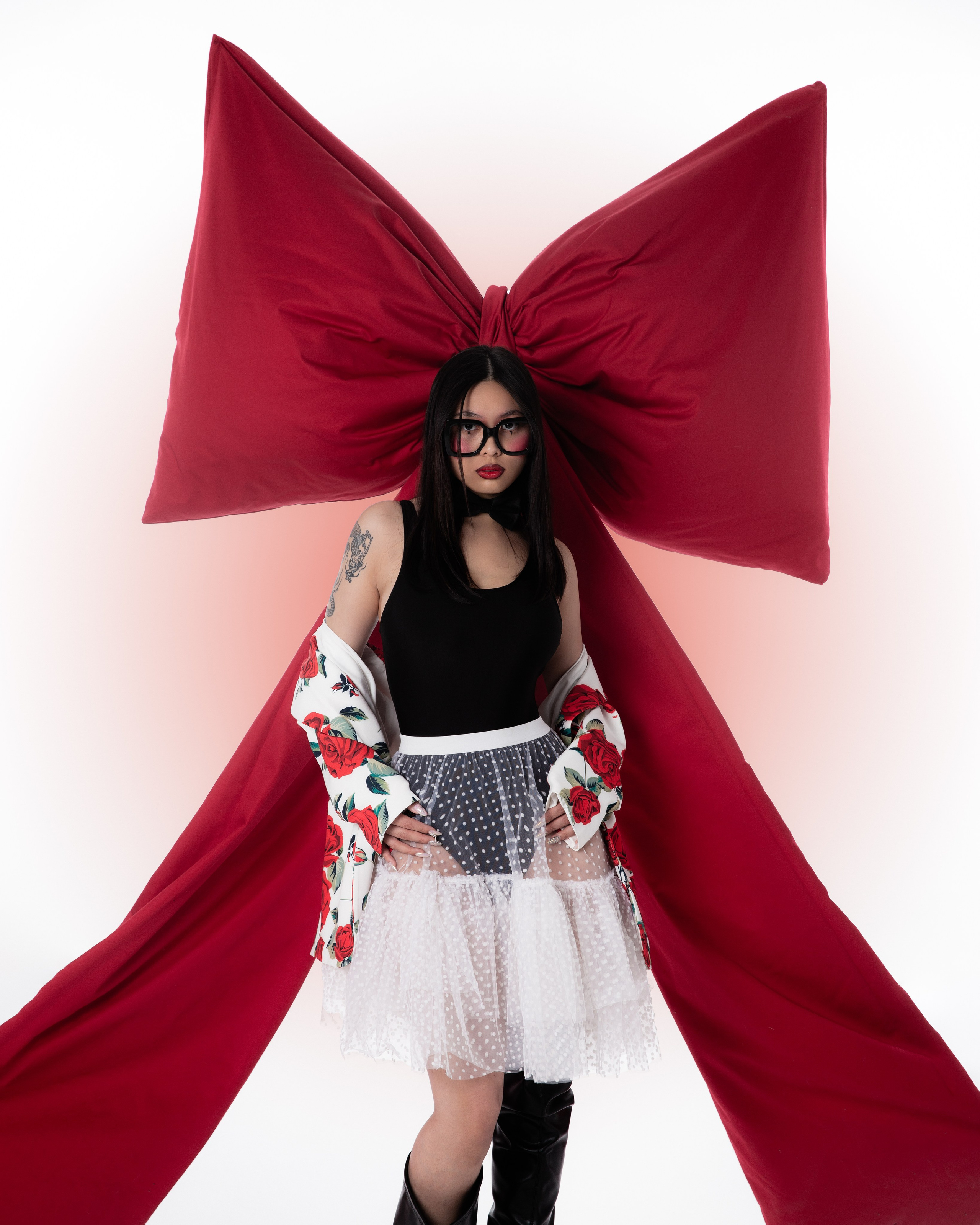 Bow. Photographer. Producer. Retoucher