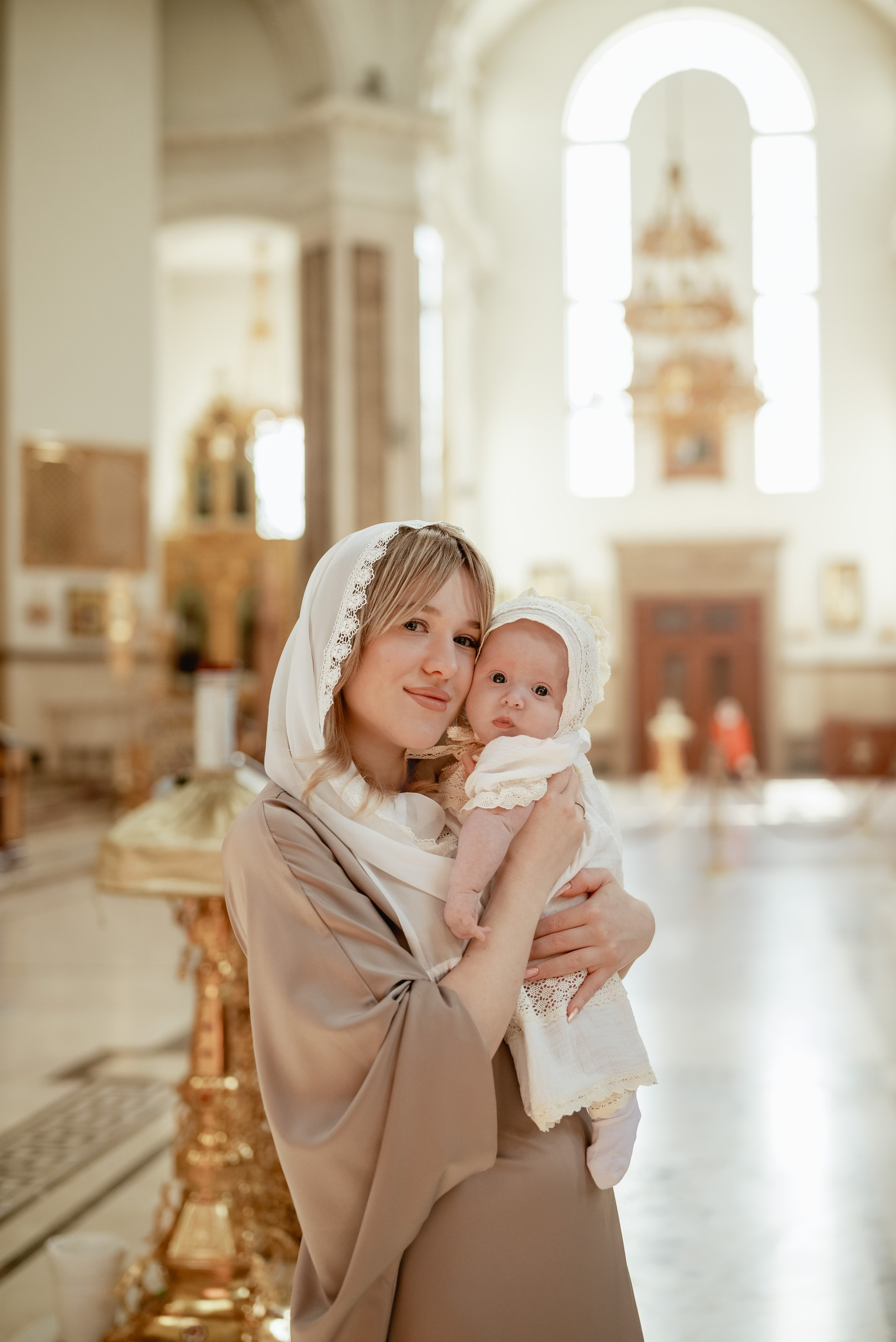Крещение в храме Петра и Февронии. Юлия Басня семейный и свадебный фотограф в Донецке