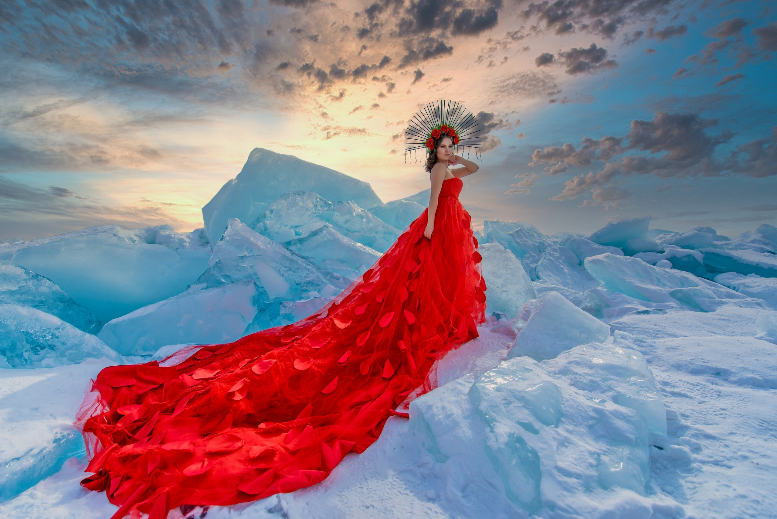 Фотосессия девушки на льду в красном платье