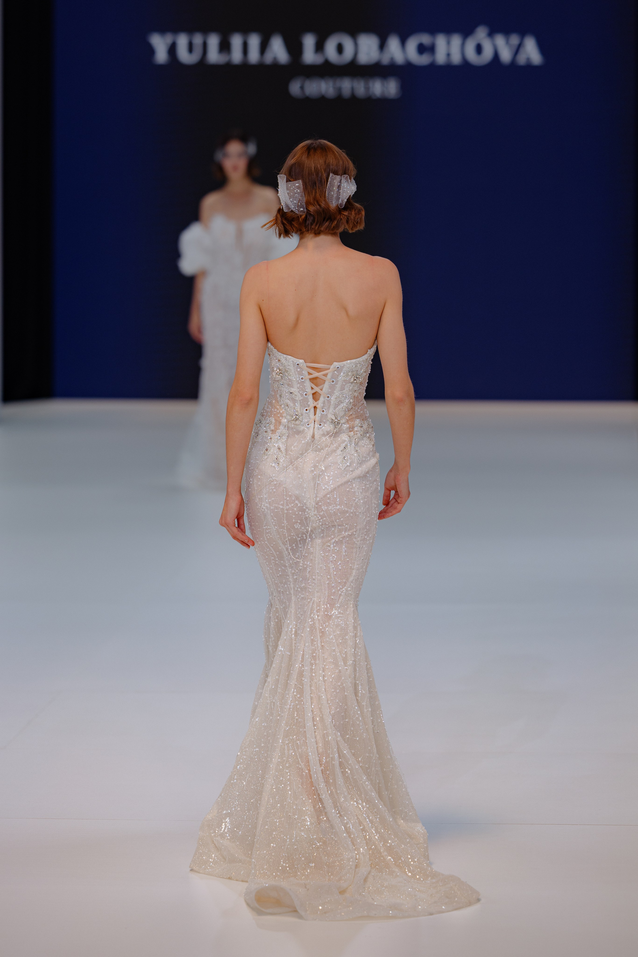 Photographer capturing catwalk moments at BBFW