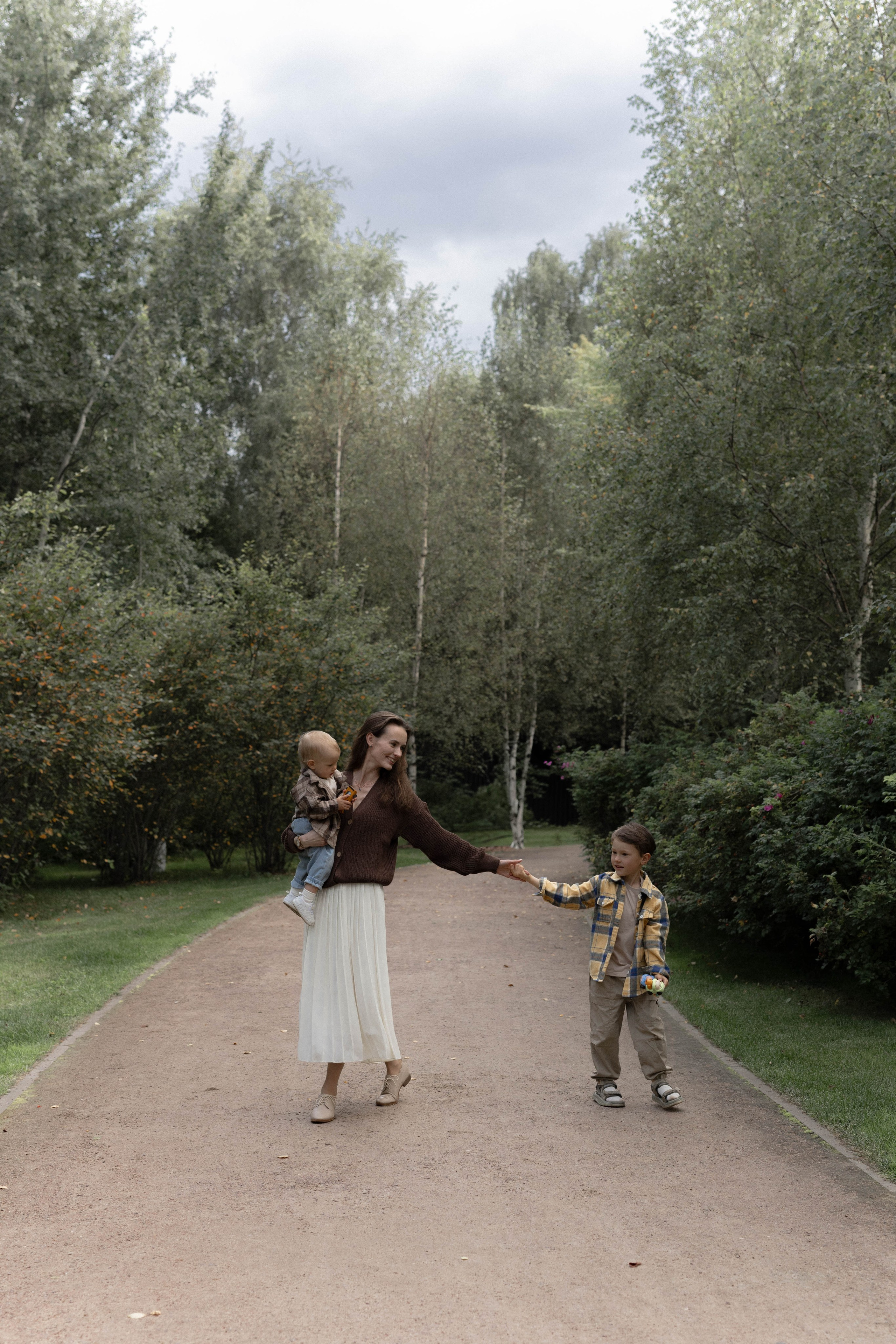 Семья в парке. Фотография о важном