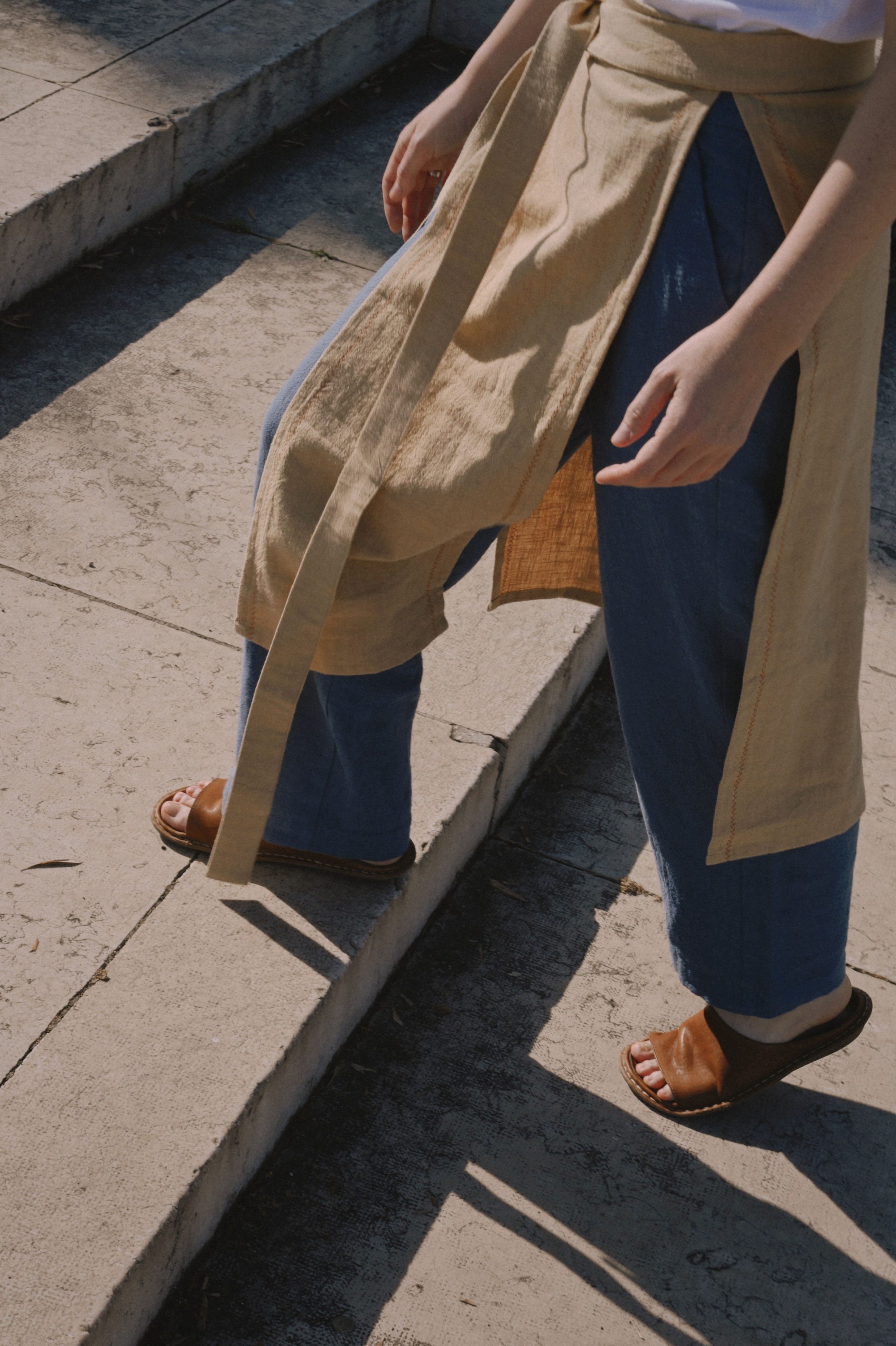 Street photoshoot for a fashion brand in Portugal steps direct sunlight