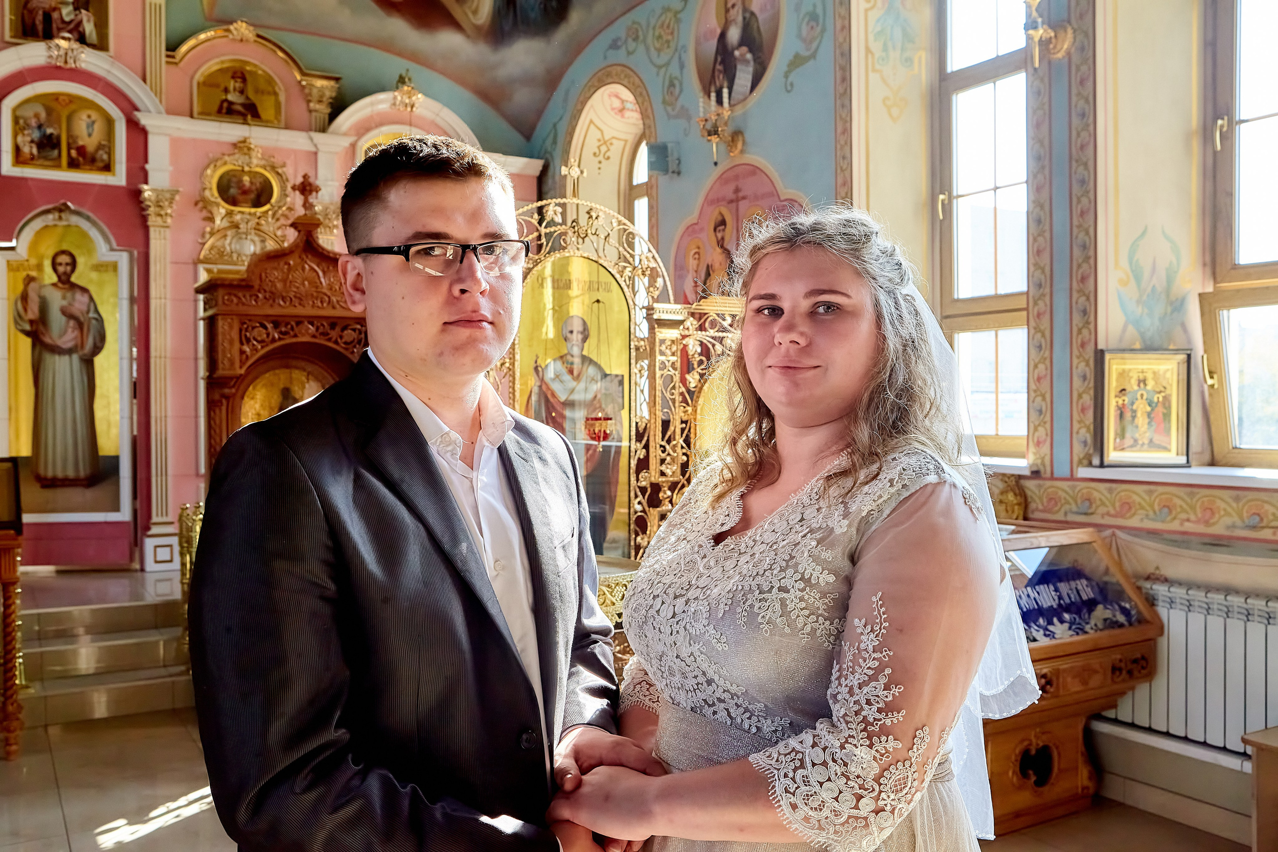 Фотосессия таинства Венчания в Храме преподобного серафима Саровского в Дзержинске фотограф Николай Голованов