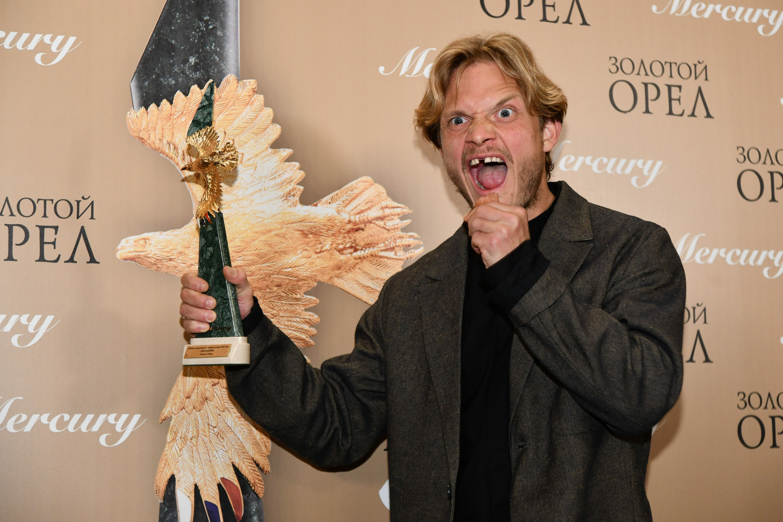 актер Евгений Ткачук