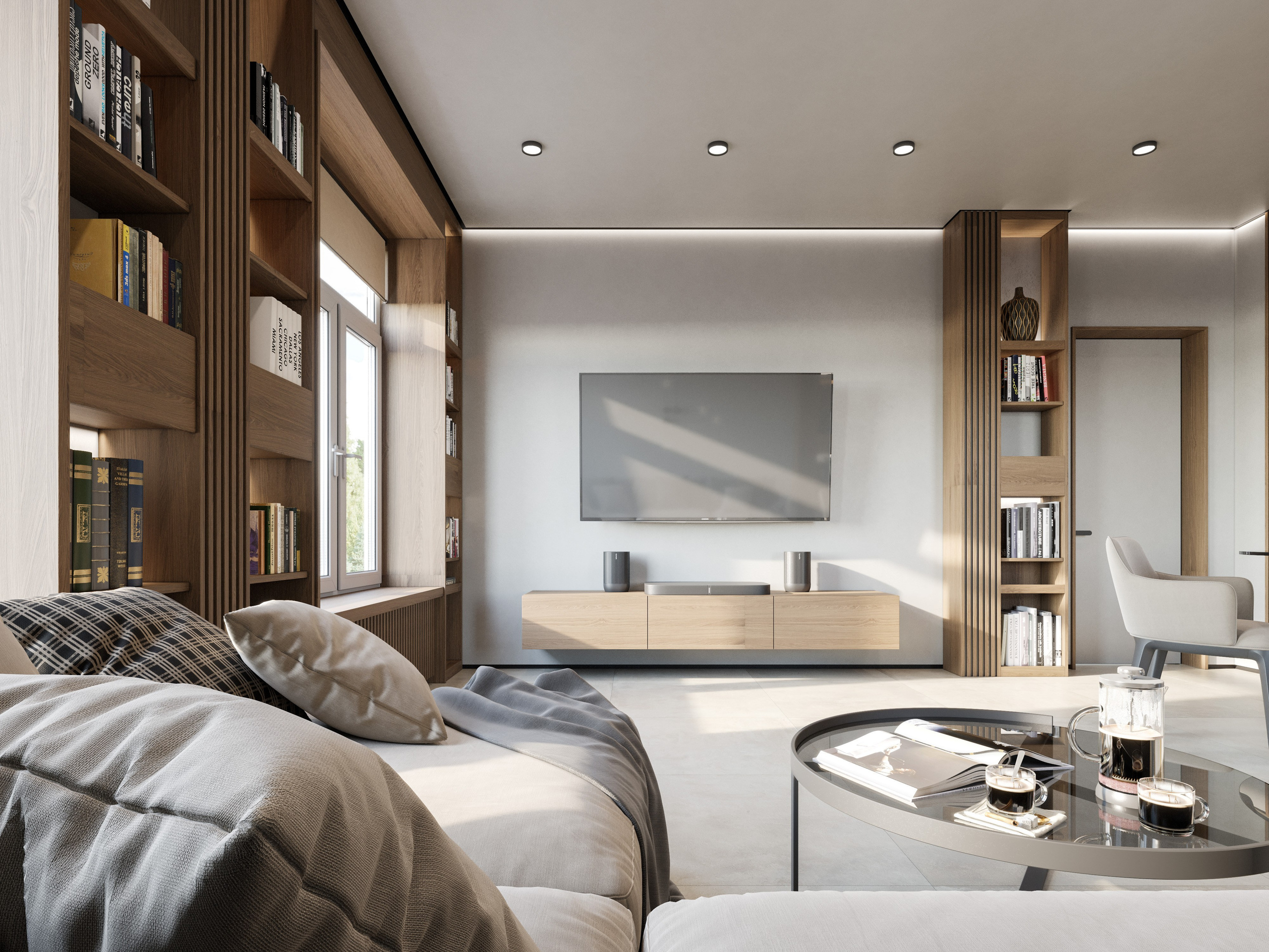 Просторная гостиная с деревяными стеллажами для книг и консольной тв-тумбой