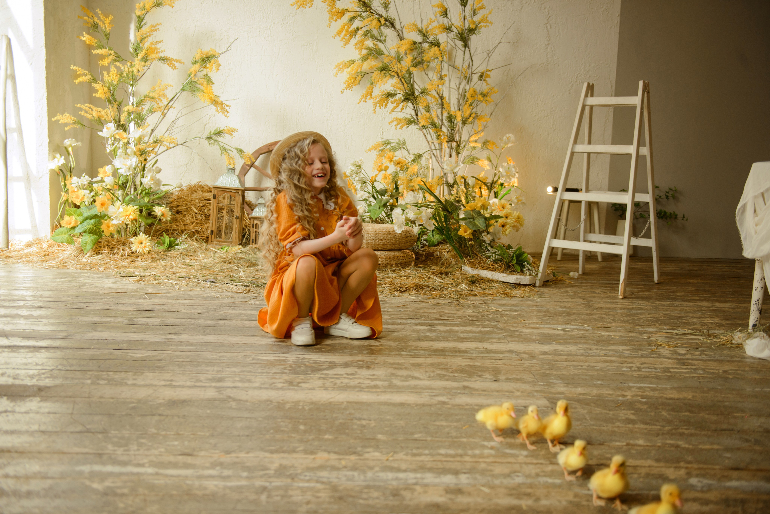 Photo shoot of a girl with goslings and a hat. Photographer Elena Carruthers, Scotland