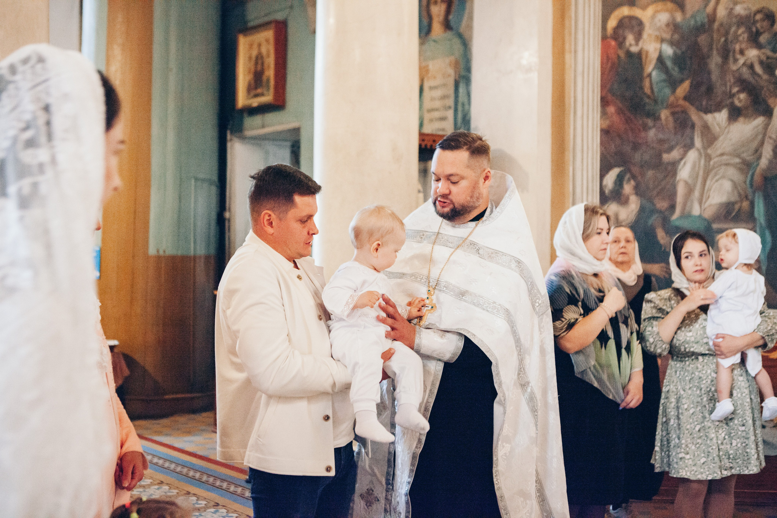 Крещение ребенка в церкви. Фотограф Ольга Ефремова