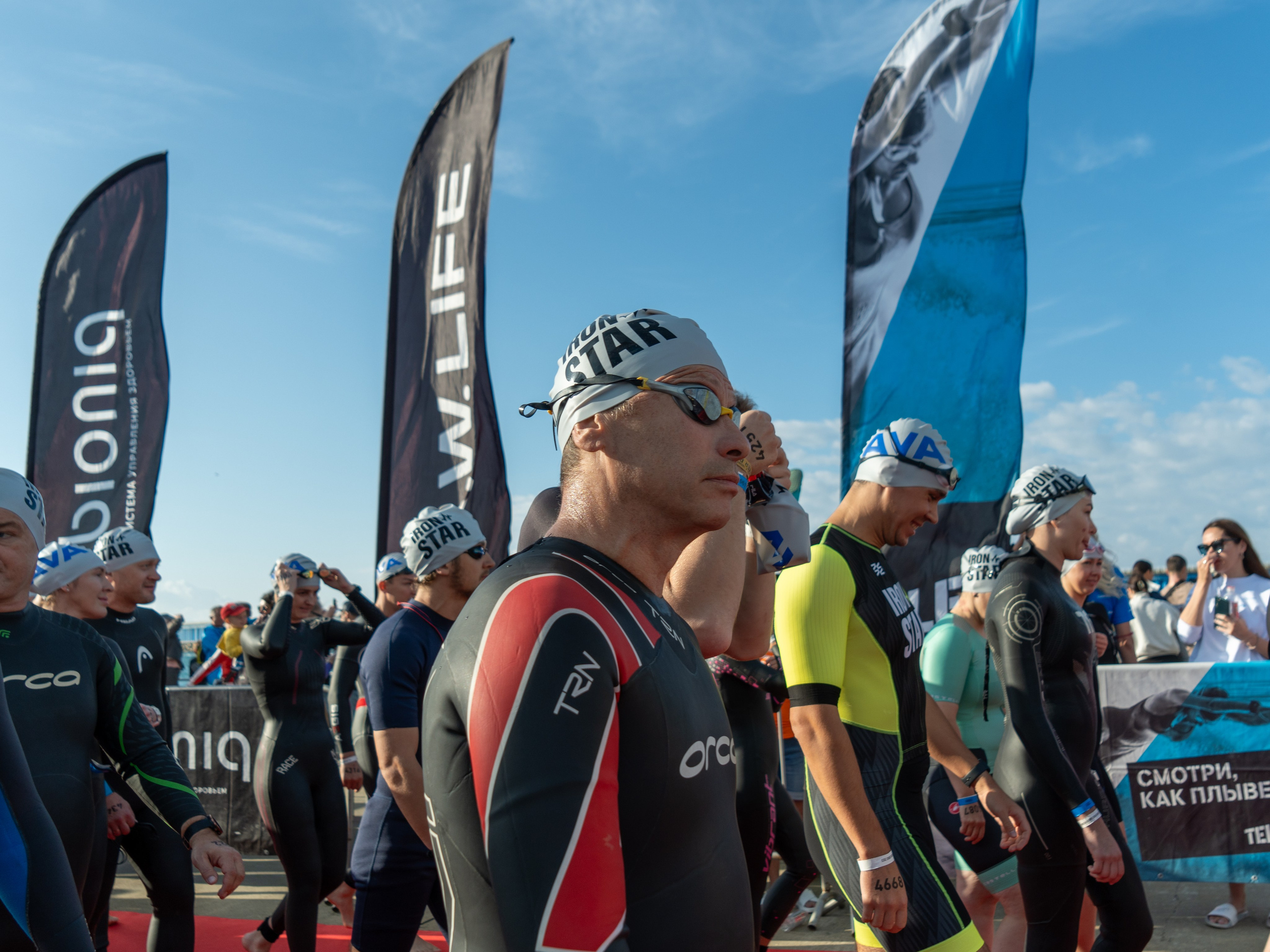 Фотоотчет партнерской интеграции для компании TELE2 на фестивале Ironstar. Репортажный фотограф в Красной Поляне и Сочи Павлюченко Екатерина