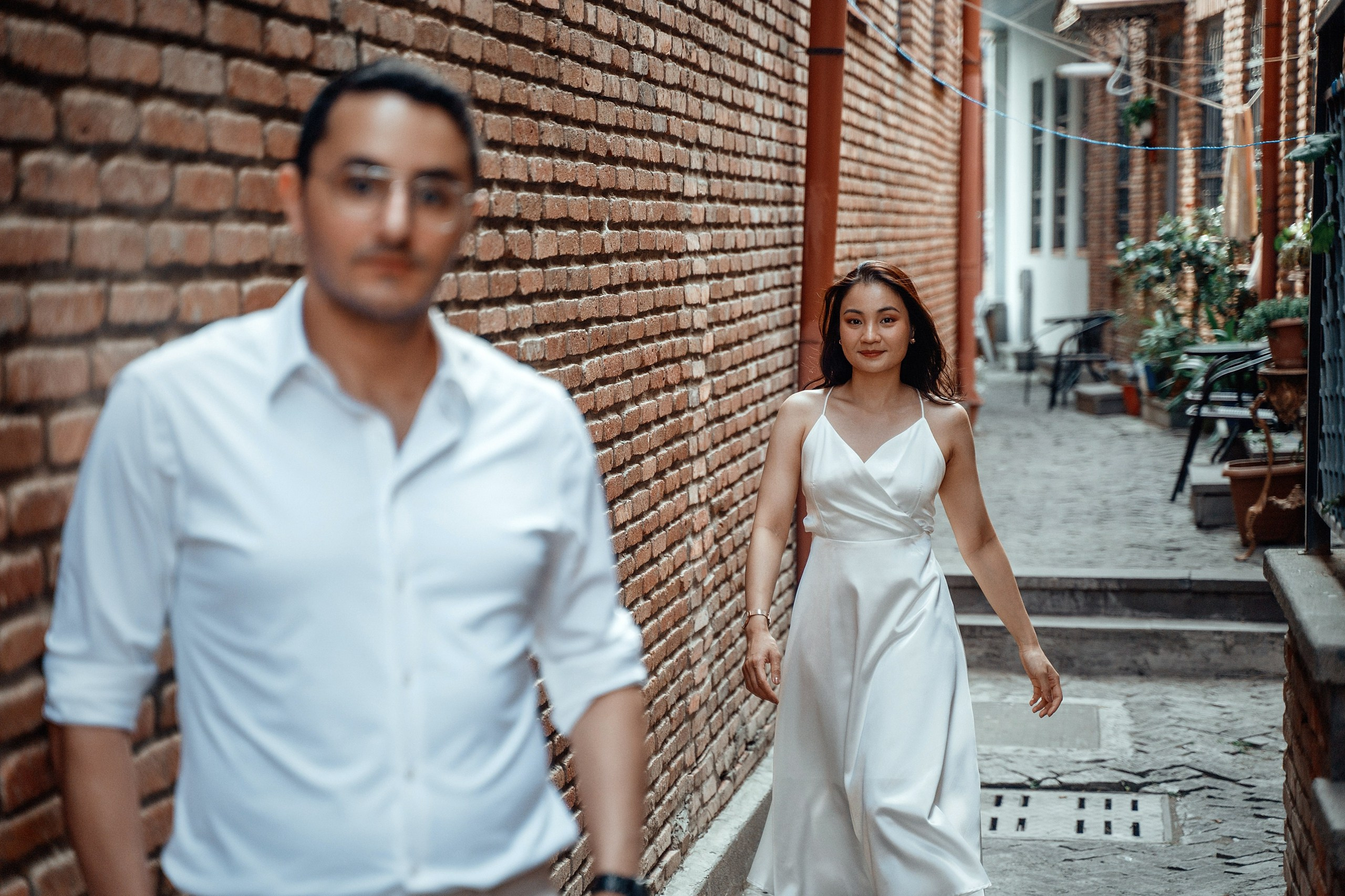 Alaeddine & Matika on the Peace Bridge in Tbilisi. Photographer Sergey Otkrytyi in Batumi & Tbilisi