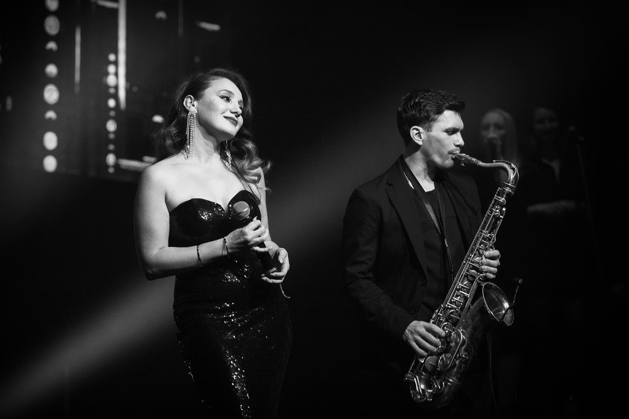 singer-and-saxophonist-perform-on-stage-during-a-live-concert-in-saint-petersburg