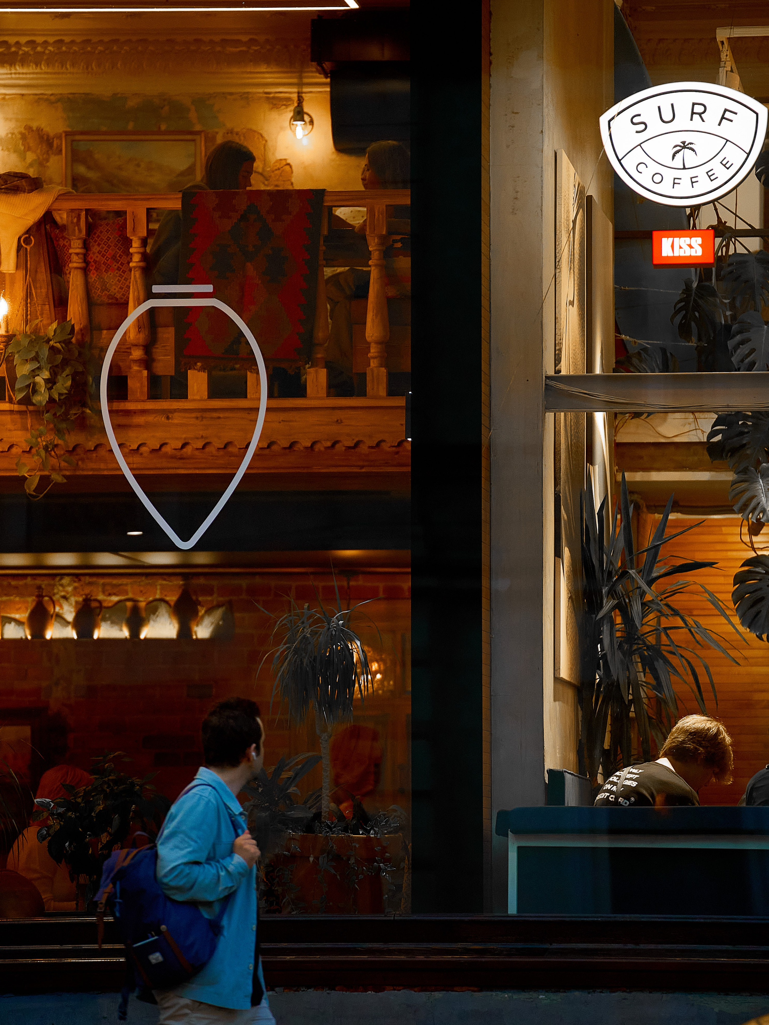 Two-story joy behind glass. Street photography from street photographer Alexander Gladky.