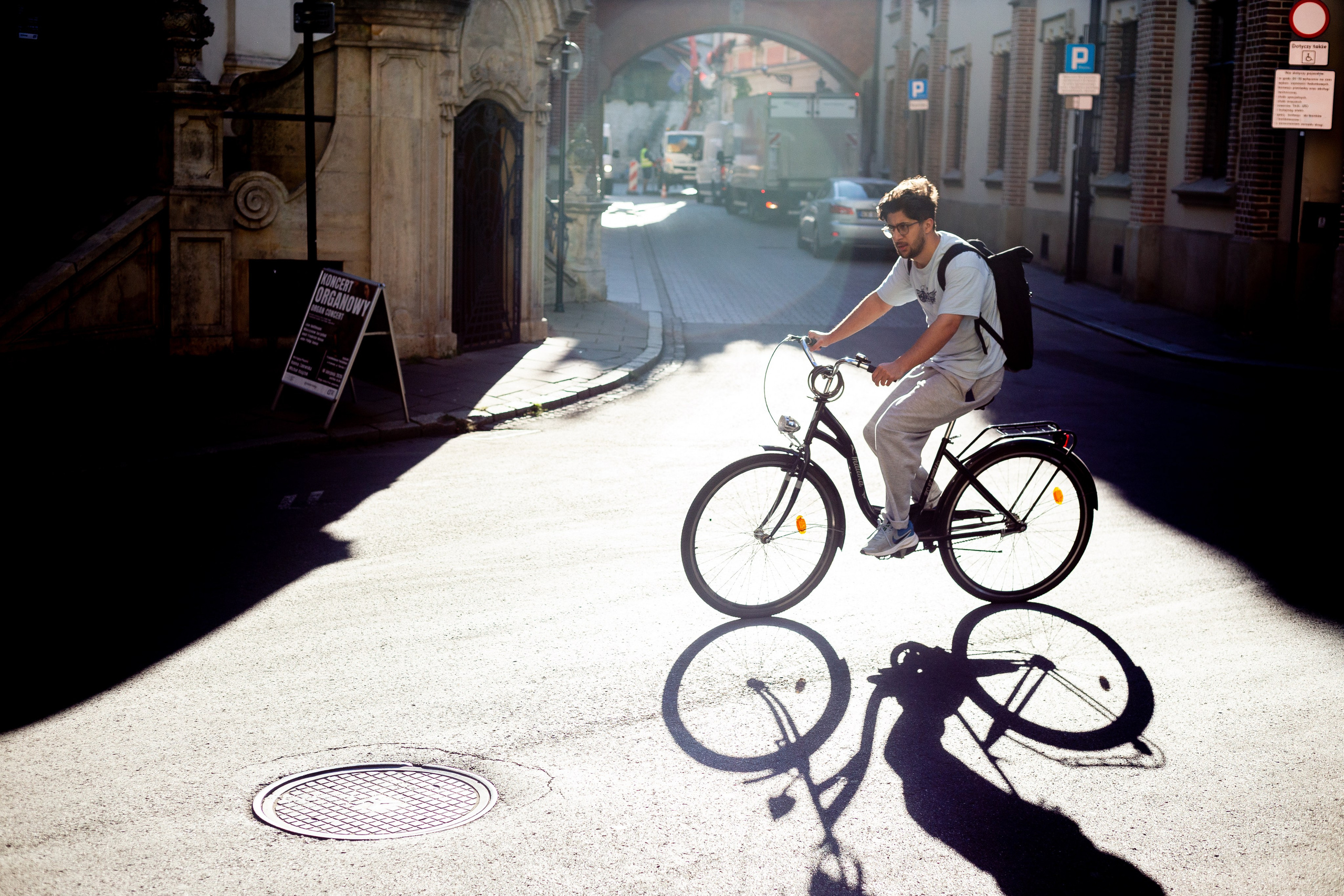 A cyclist on the streets of Kraków