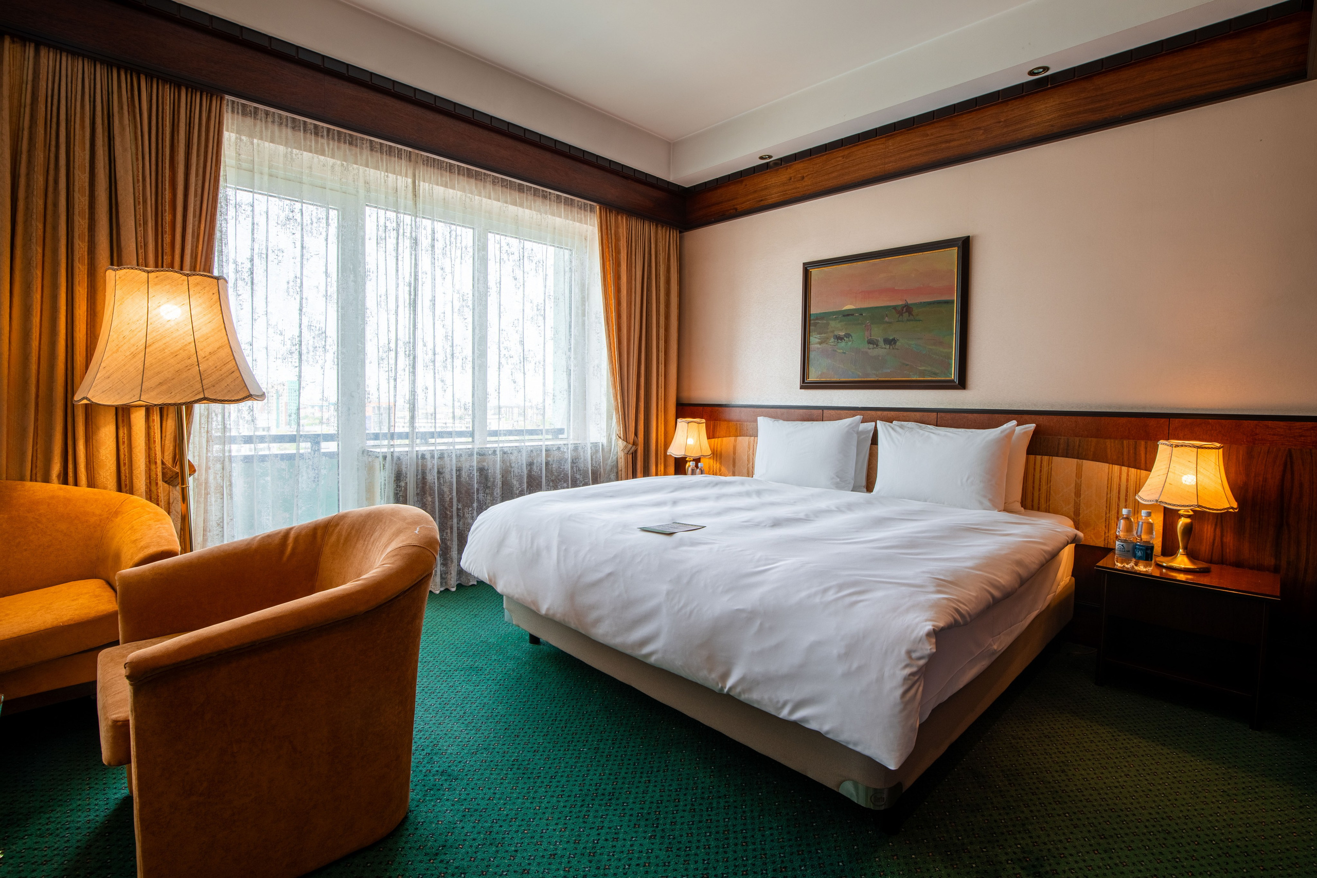 Интерьерная фотография люкс номера в отеле