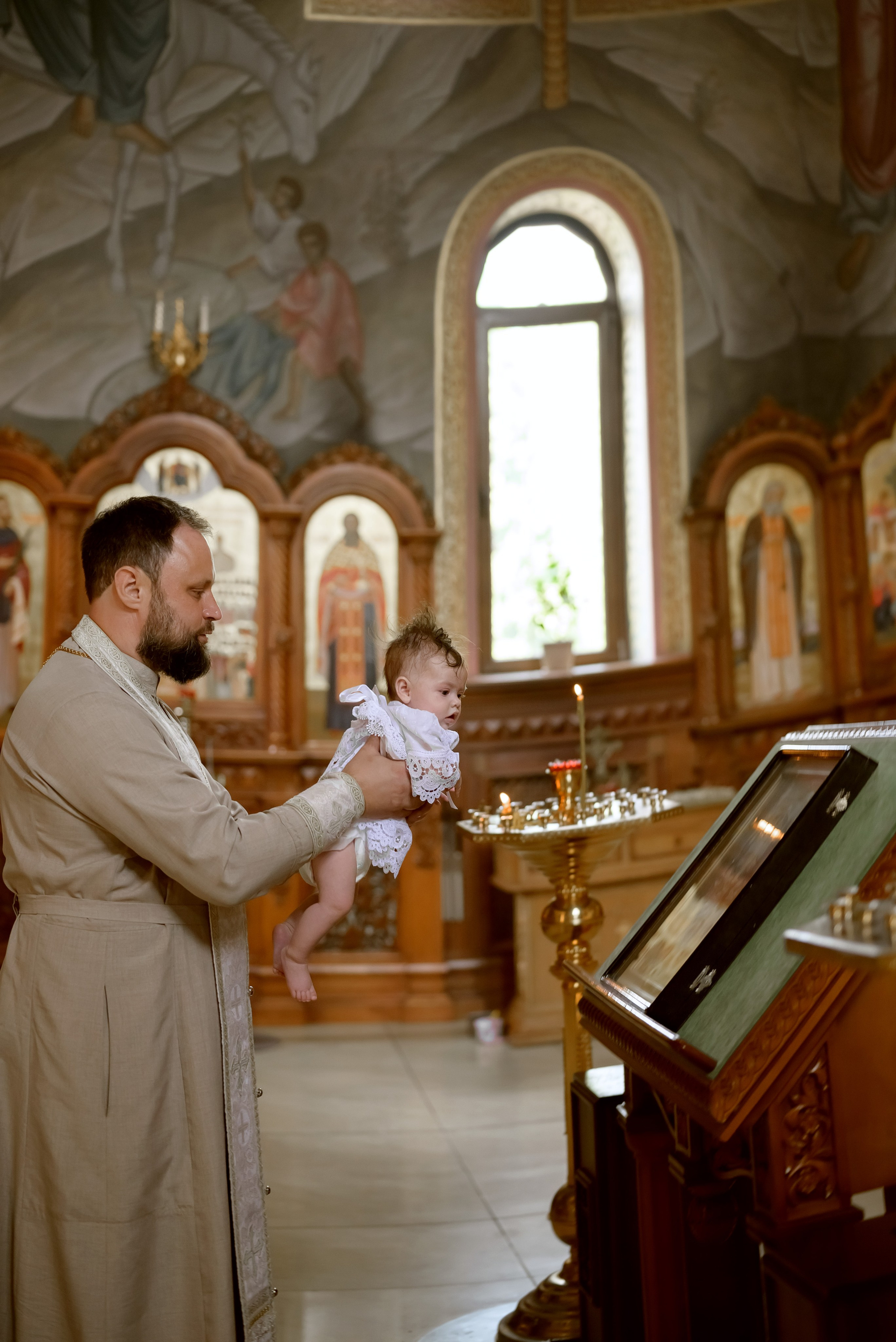 Таинство Крещения в Макеевке. Юлия Басня семейный и свадебный фотограф в Донецке