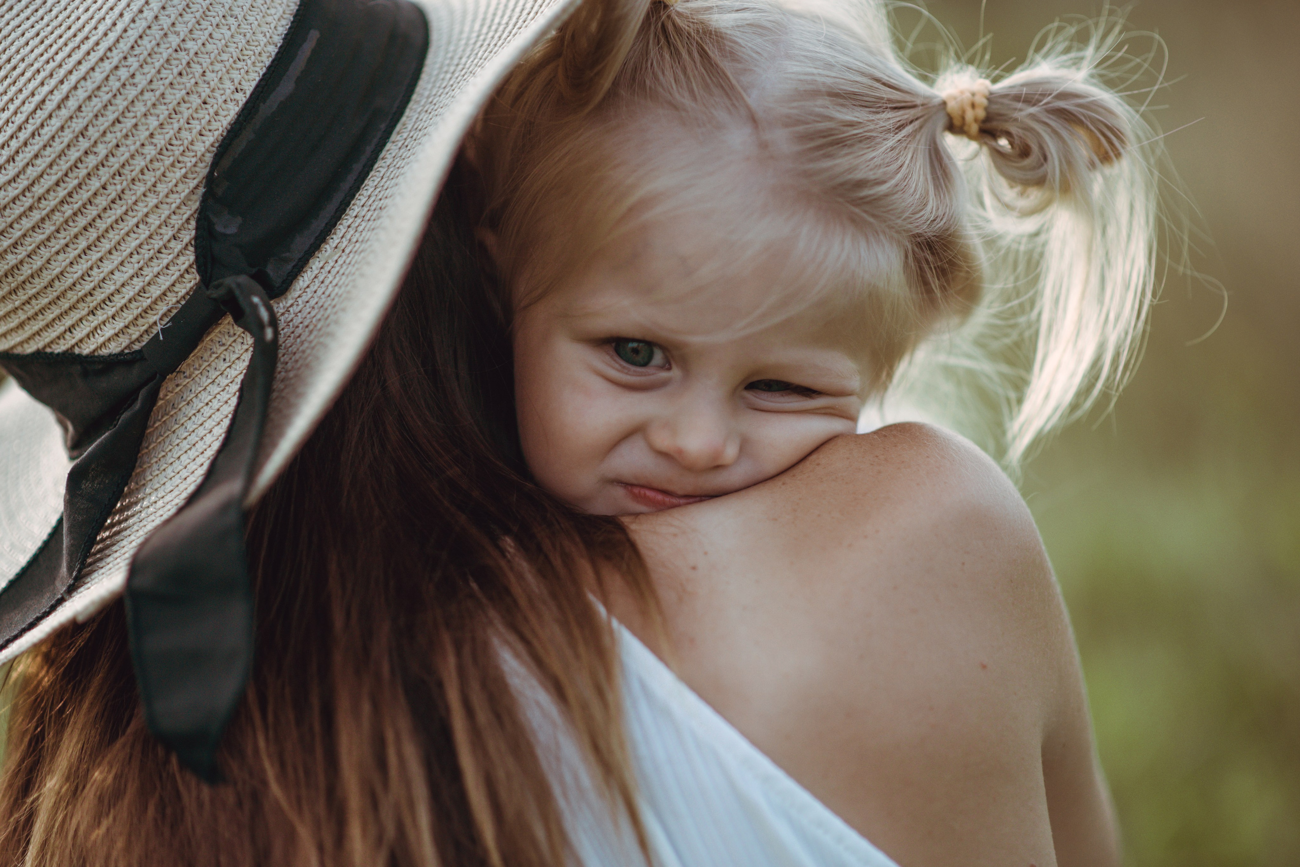 Girl looking at the camera in a meadow