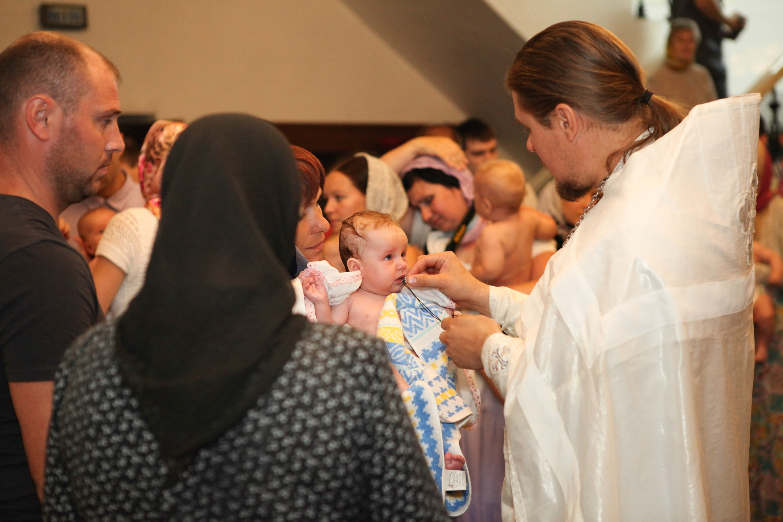 Крещение Георгия. Фотограф Александр Заломаев