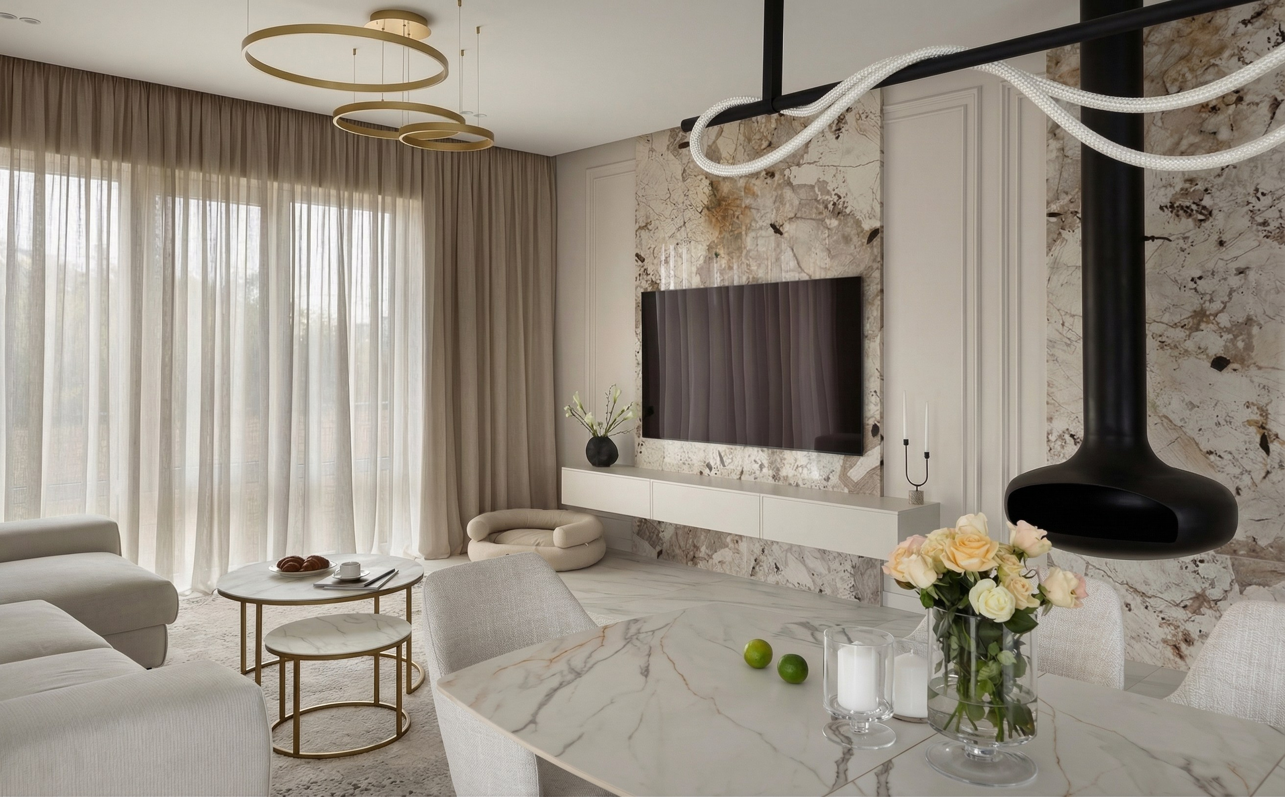 Современная ТВ-зона и гостиная в премиальном доме 129 м2 в Краснодаре от Валерии Котович. Каменное панно за телевизором, подвесной камин, бежевый диван и дизайнерские светильники в интерьере.