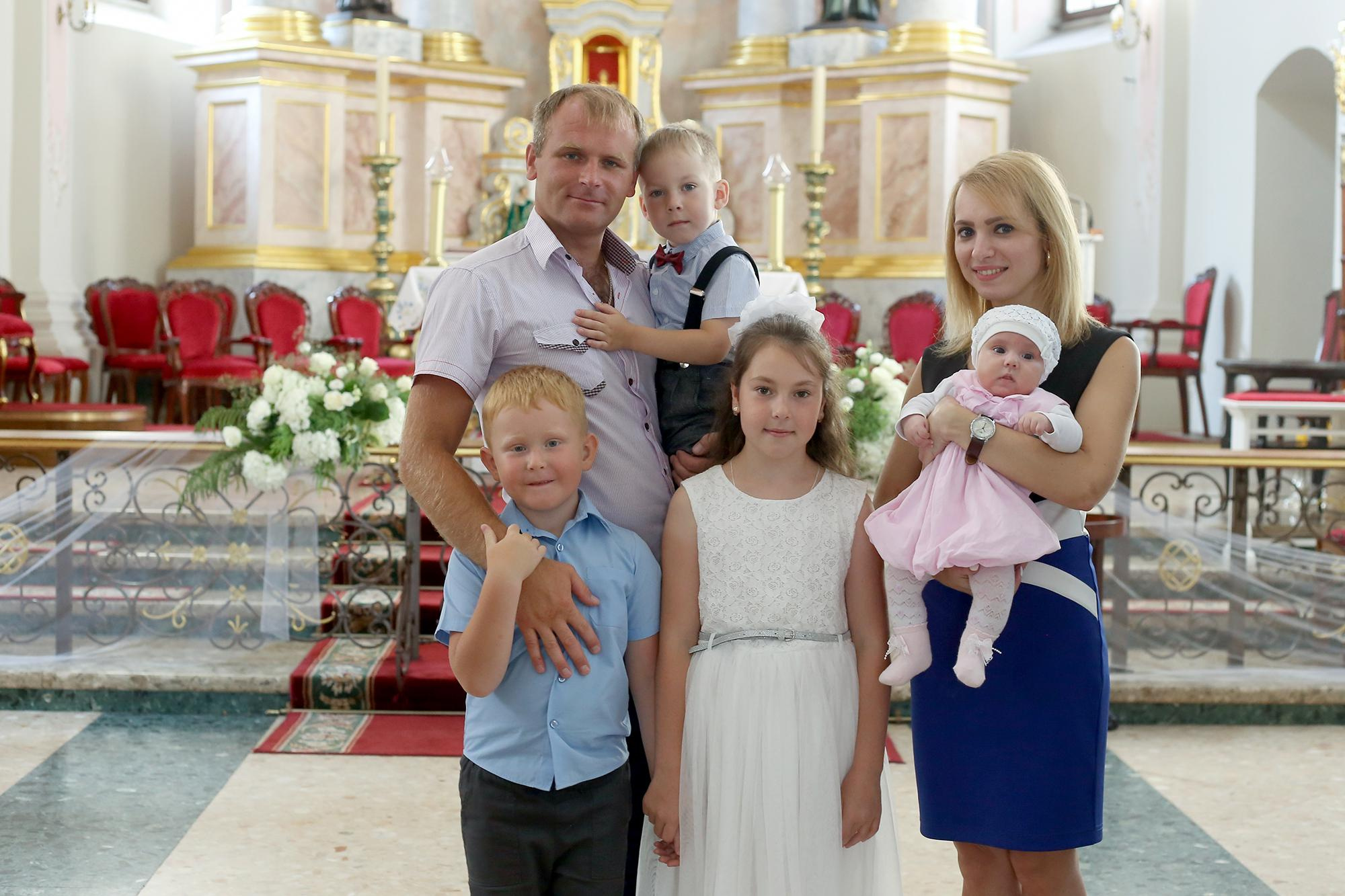 Крещение ребенка в костёле. Юлия Дейкун — семейный фотограф в Минске