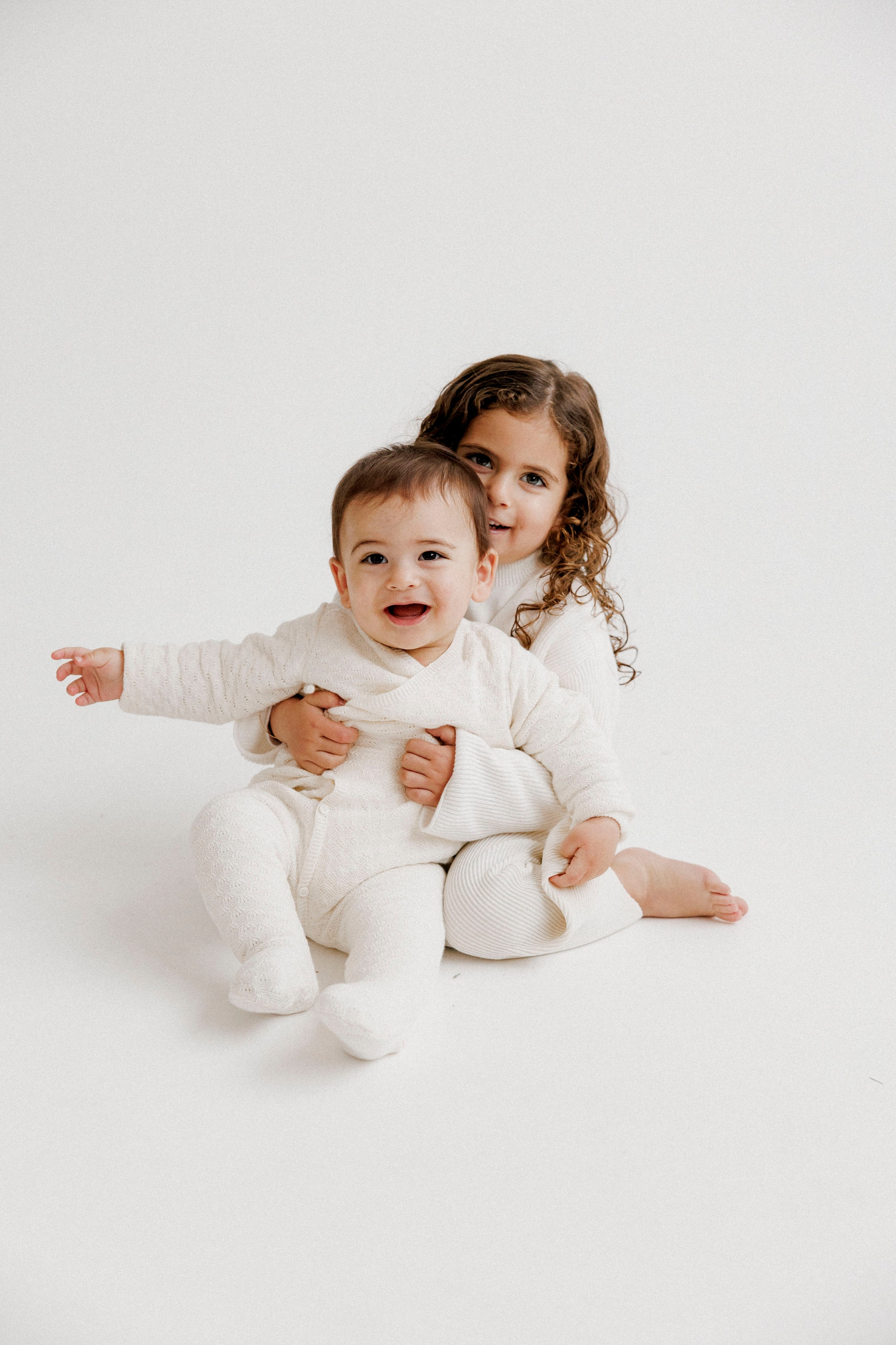 Family photoshoot in White Studio. Wedding and family photographer