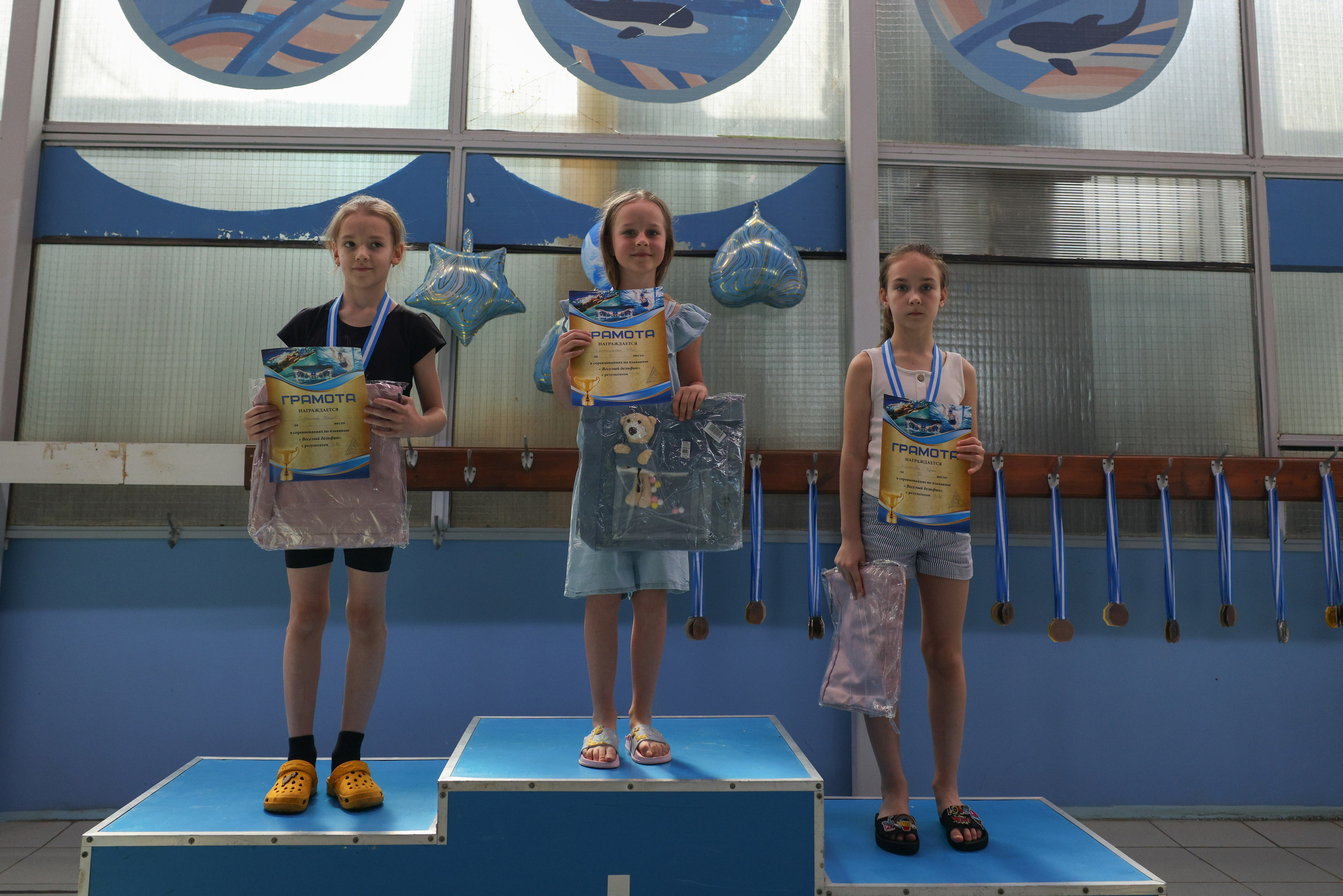 Веселый дельфин. Плавание. Дети 8-9 лет. Фотограф Александр Заломаев